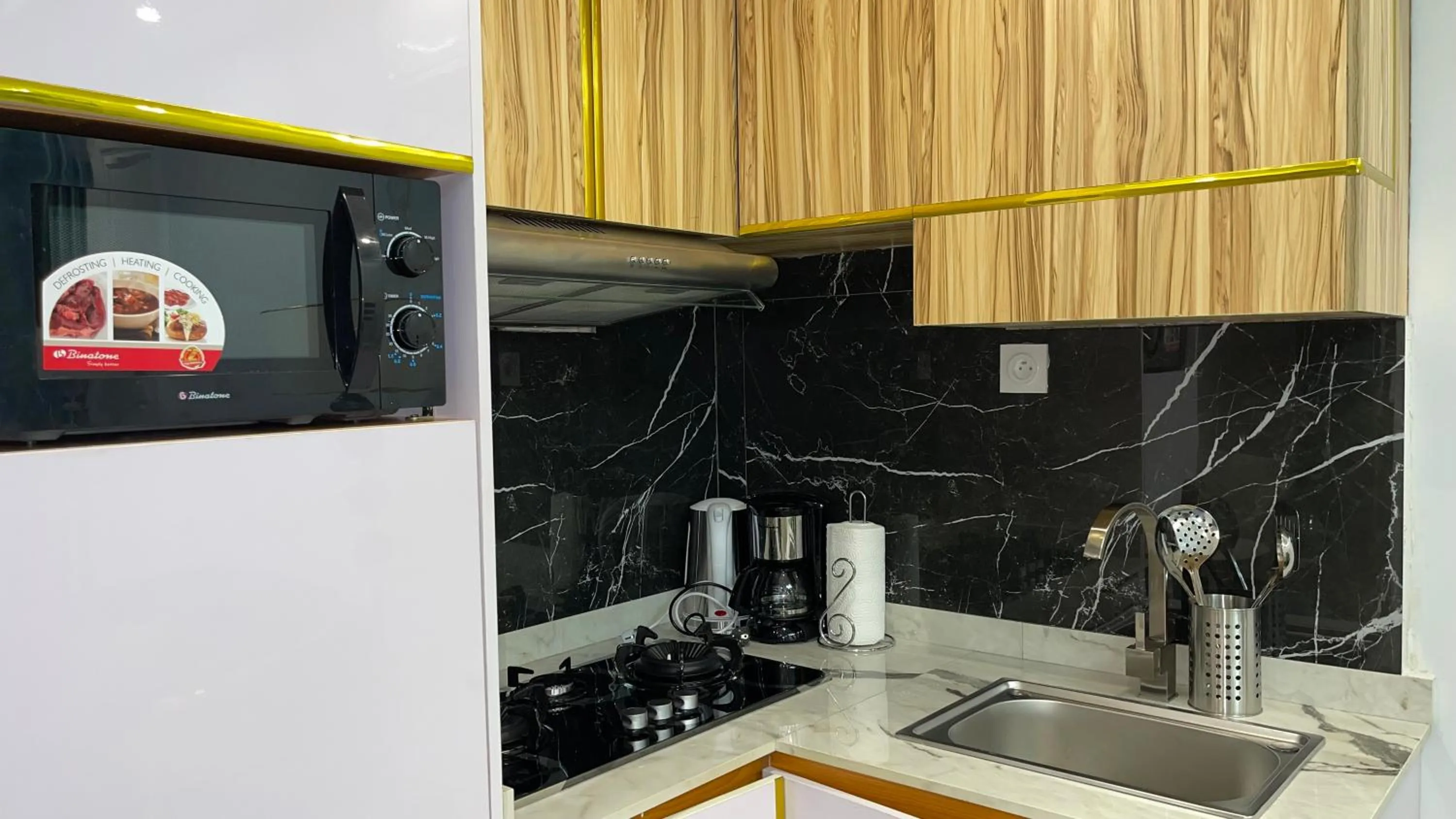 Kitchen or kitchenette in Suna' a Home Bonapriso