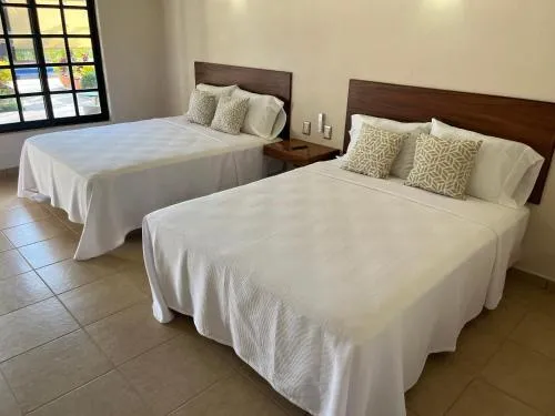 Natura Hotel & Villas