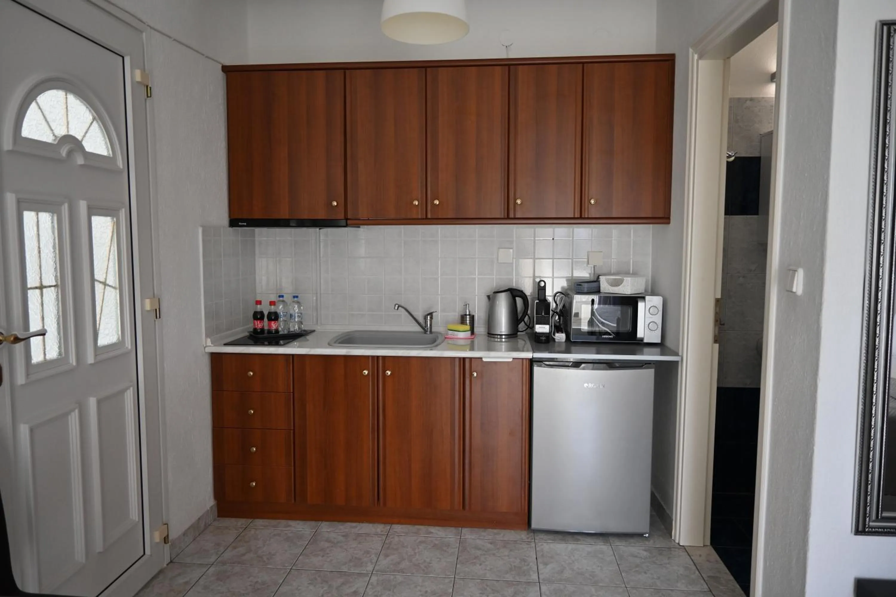 Kitchen or kitchenette in Doukas Aparthotel