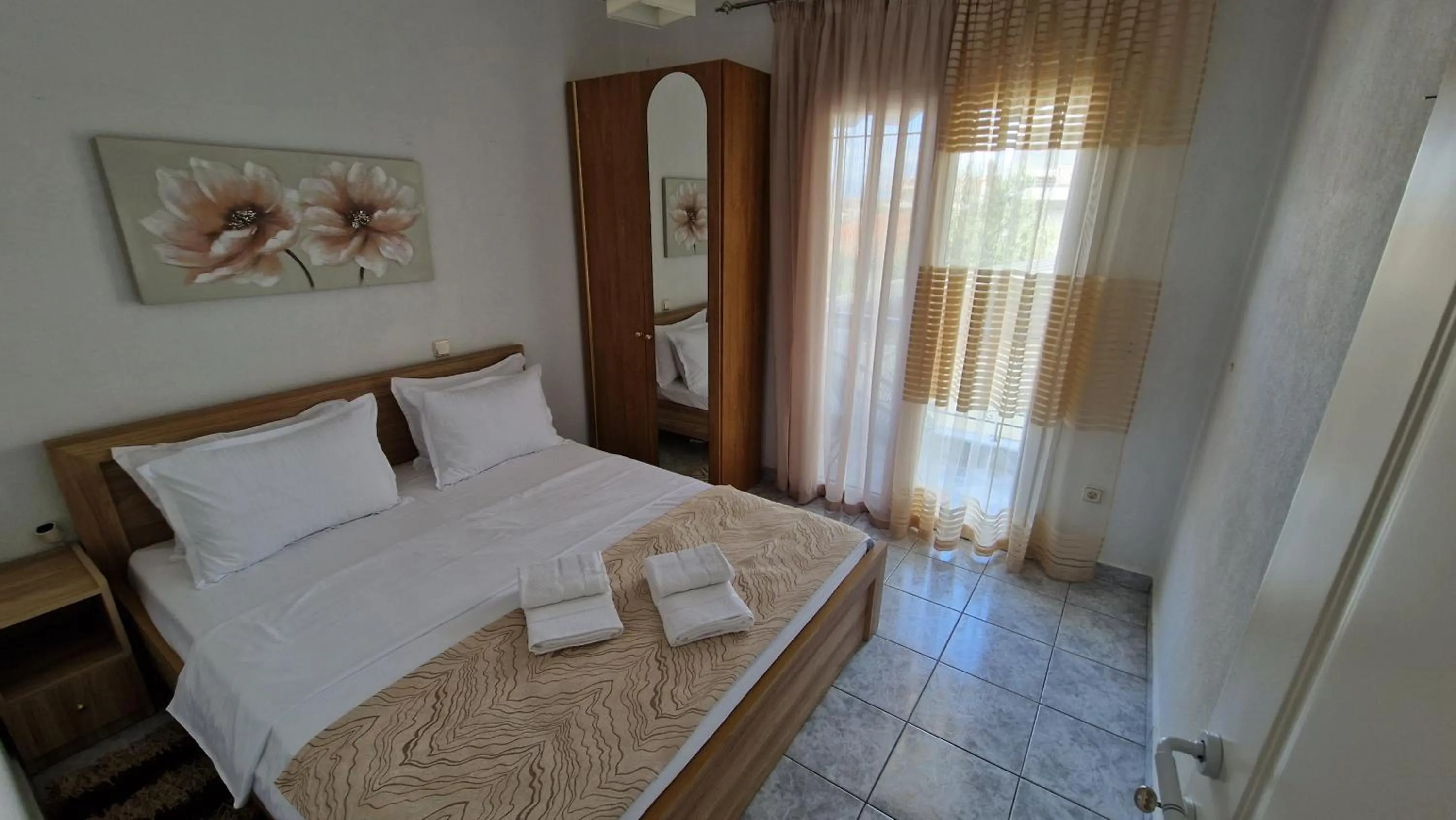 Bed in Doukas Aparthotel