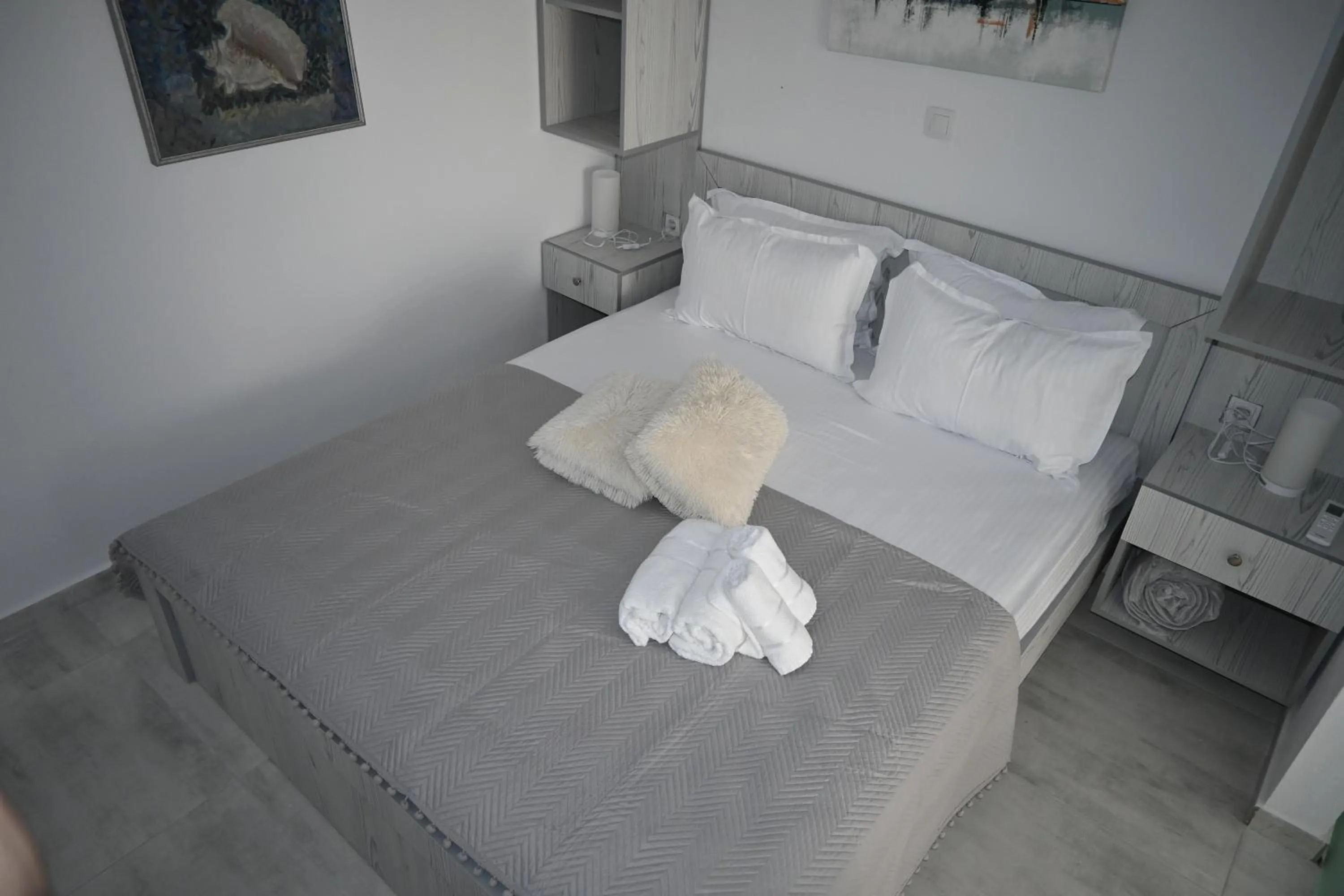 Bed in Doukas Aparthotel