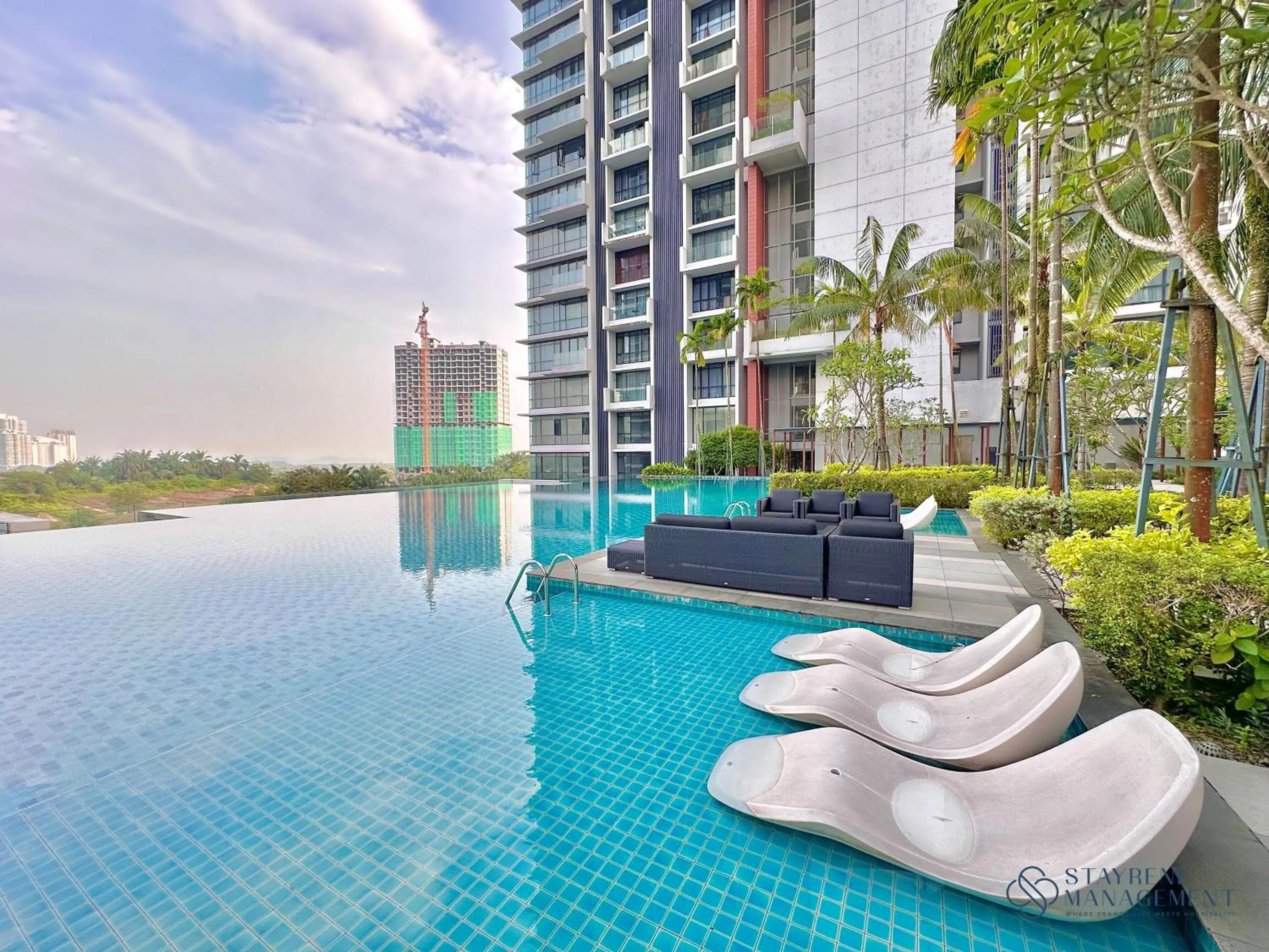 Swimming pool in Grand Medini Residence Nusajaya by Stayrene