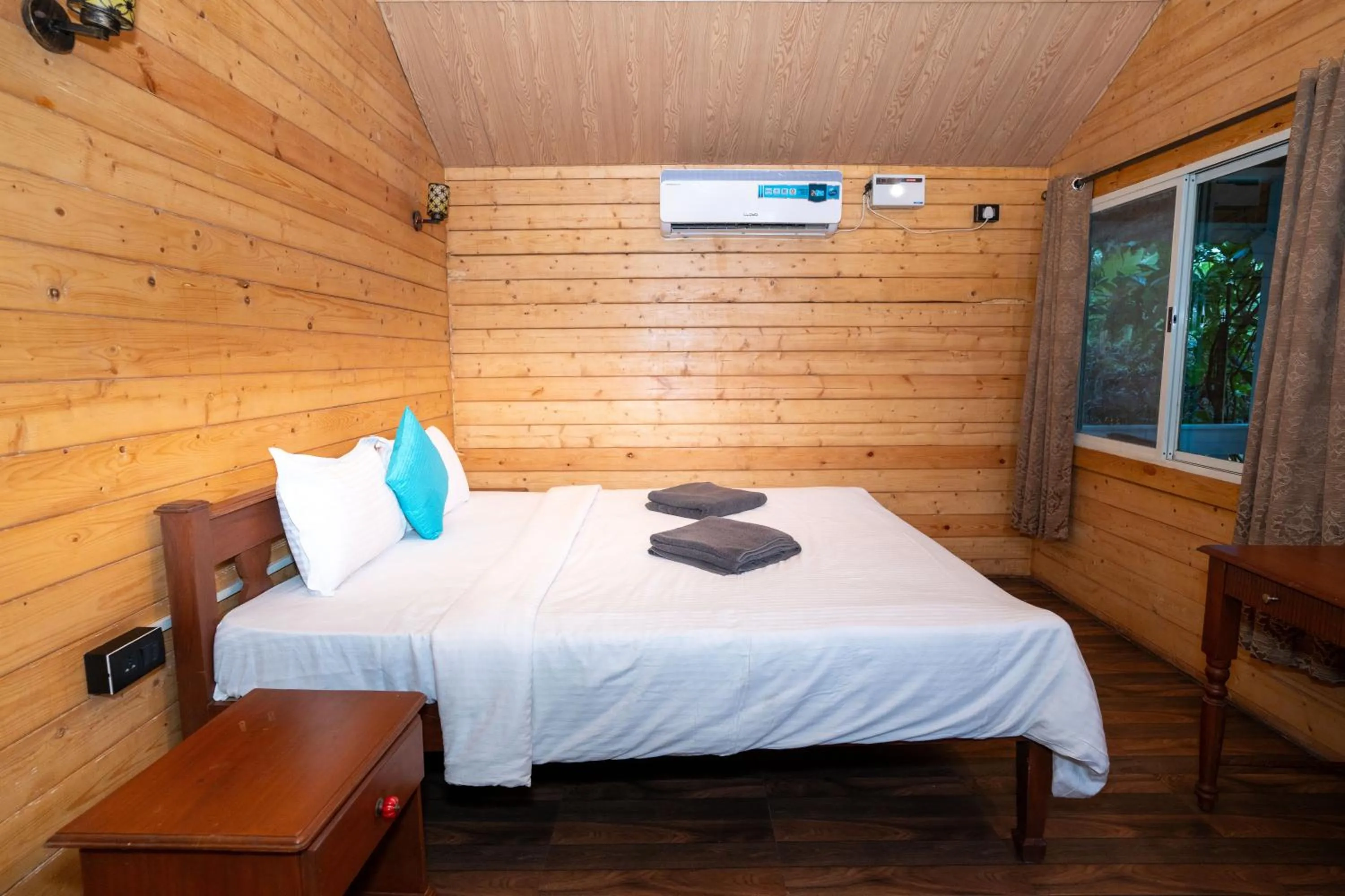 Bed in Nasya Beachside Cottages