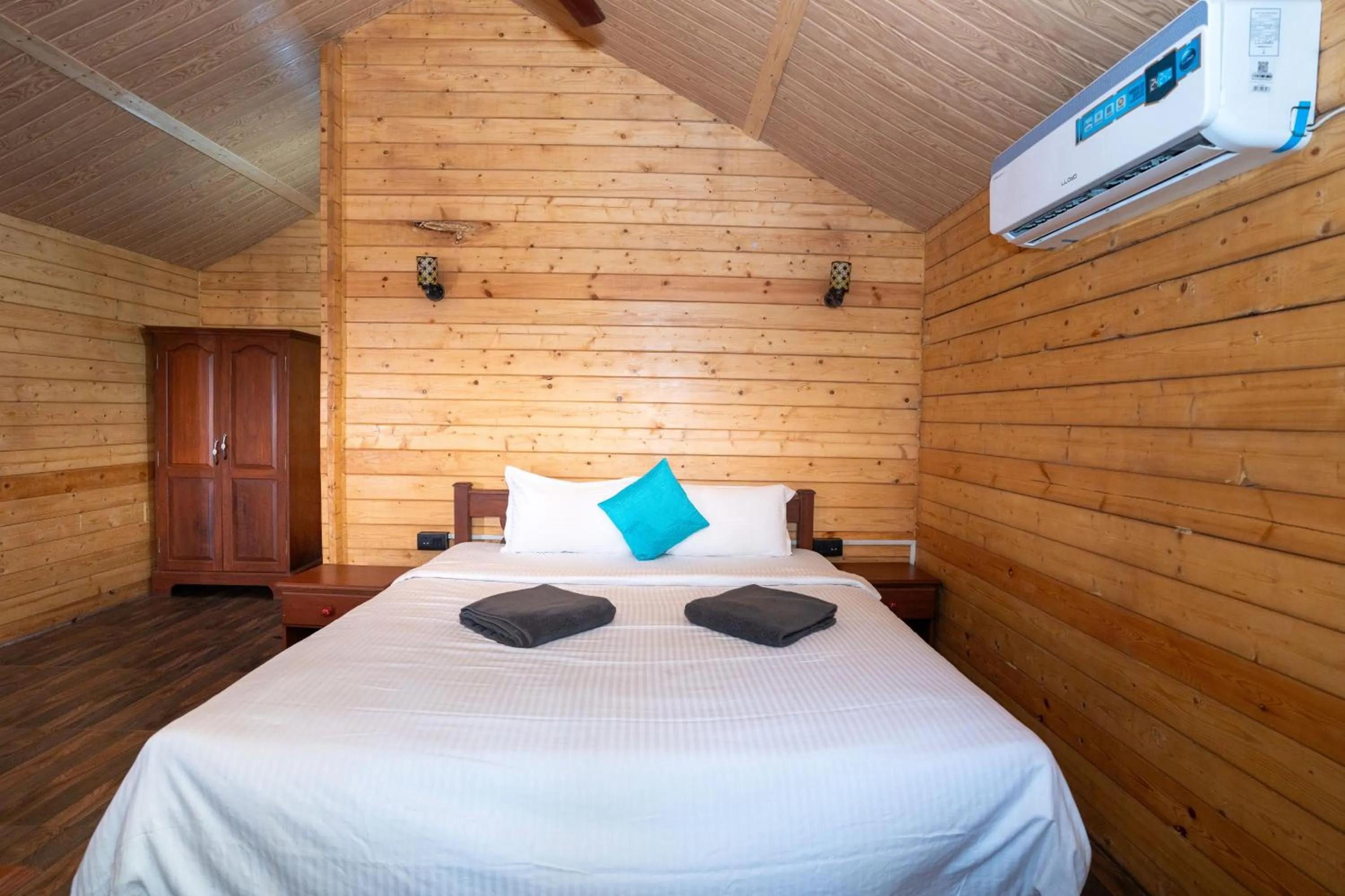 Bed in Nasya Beachside Cottages