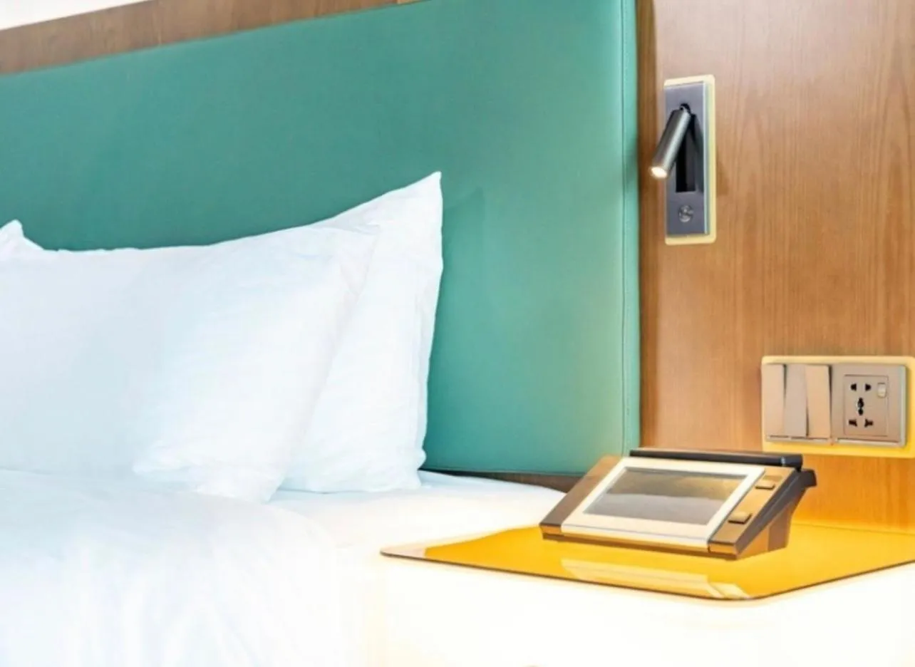 Bed in L&L Central Hotel