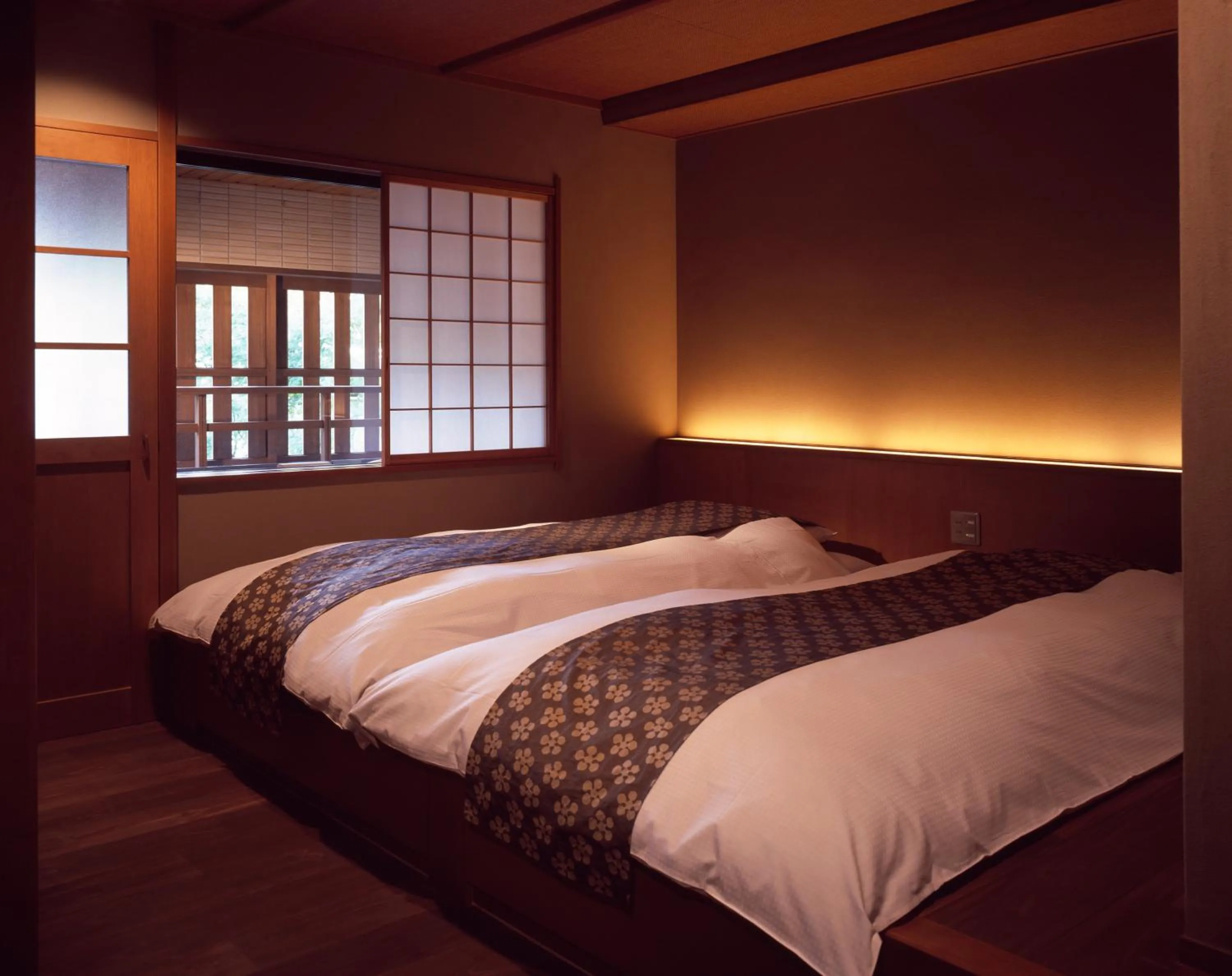 Bed in Ryokan Sumiya Kihoan
