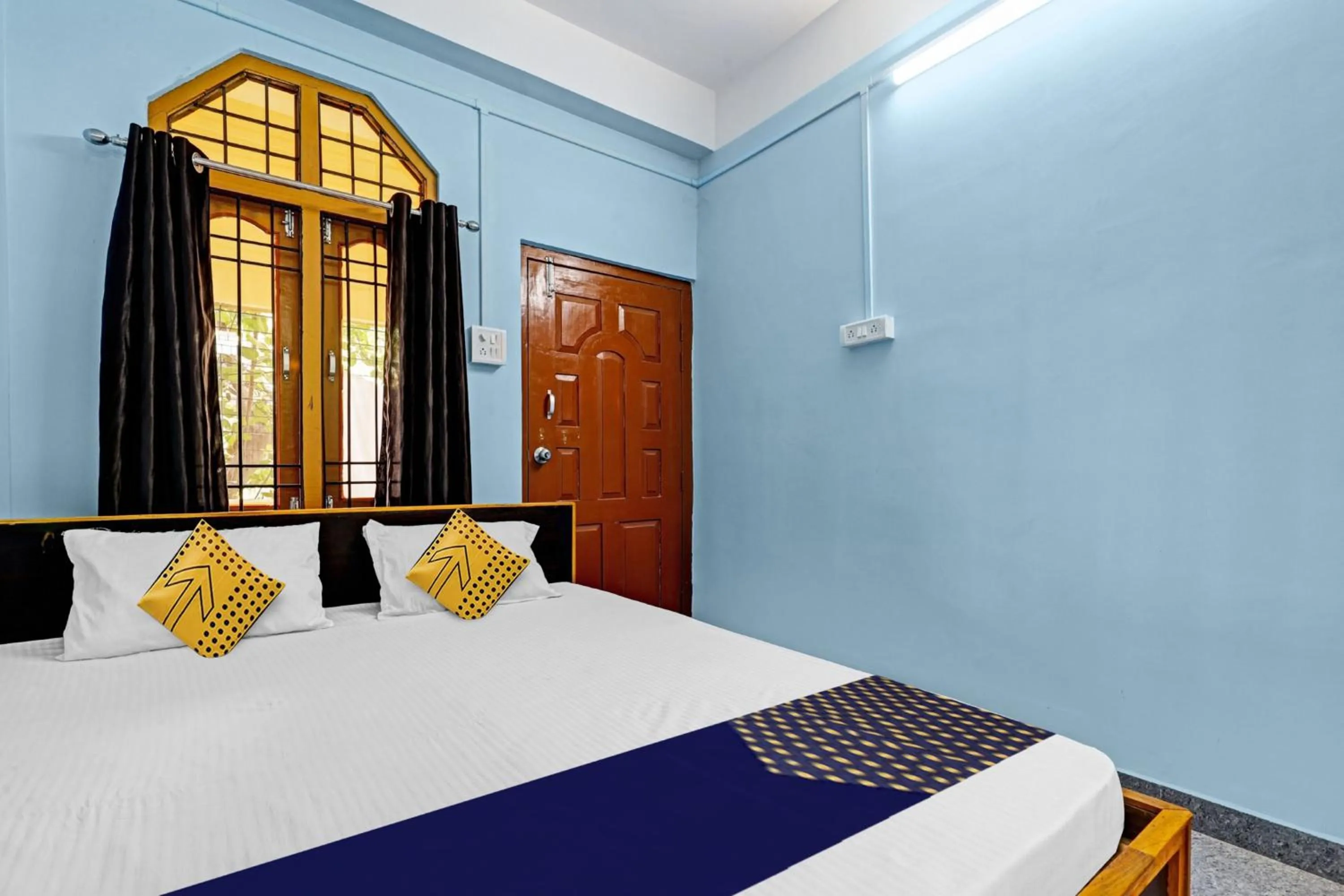 Bedroom, Bed in Hotel O Garam Masala Residency