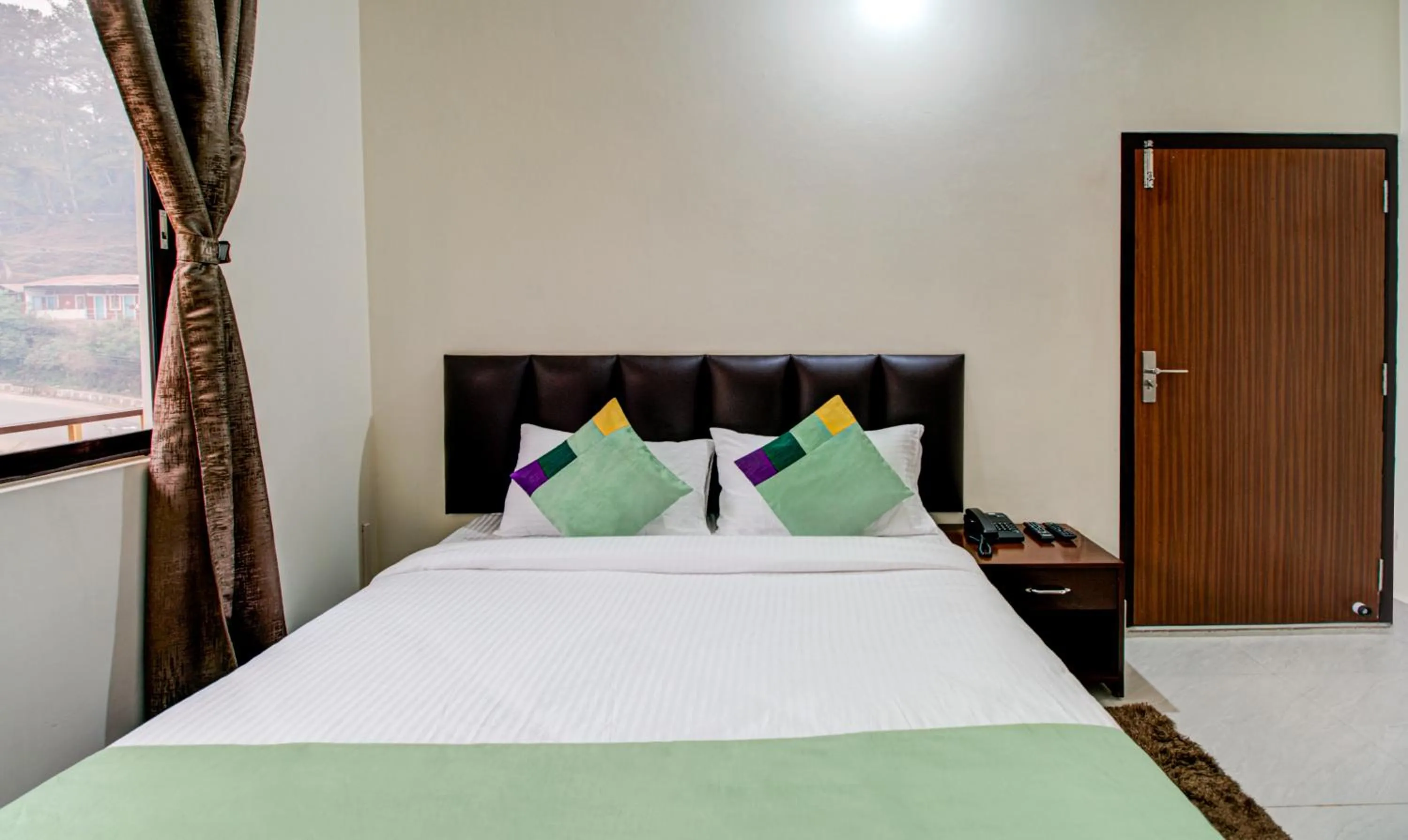 Bed in Treebo Staying Center