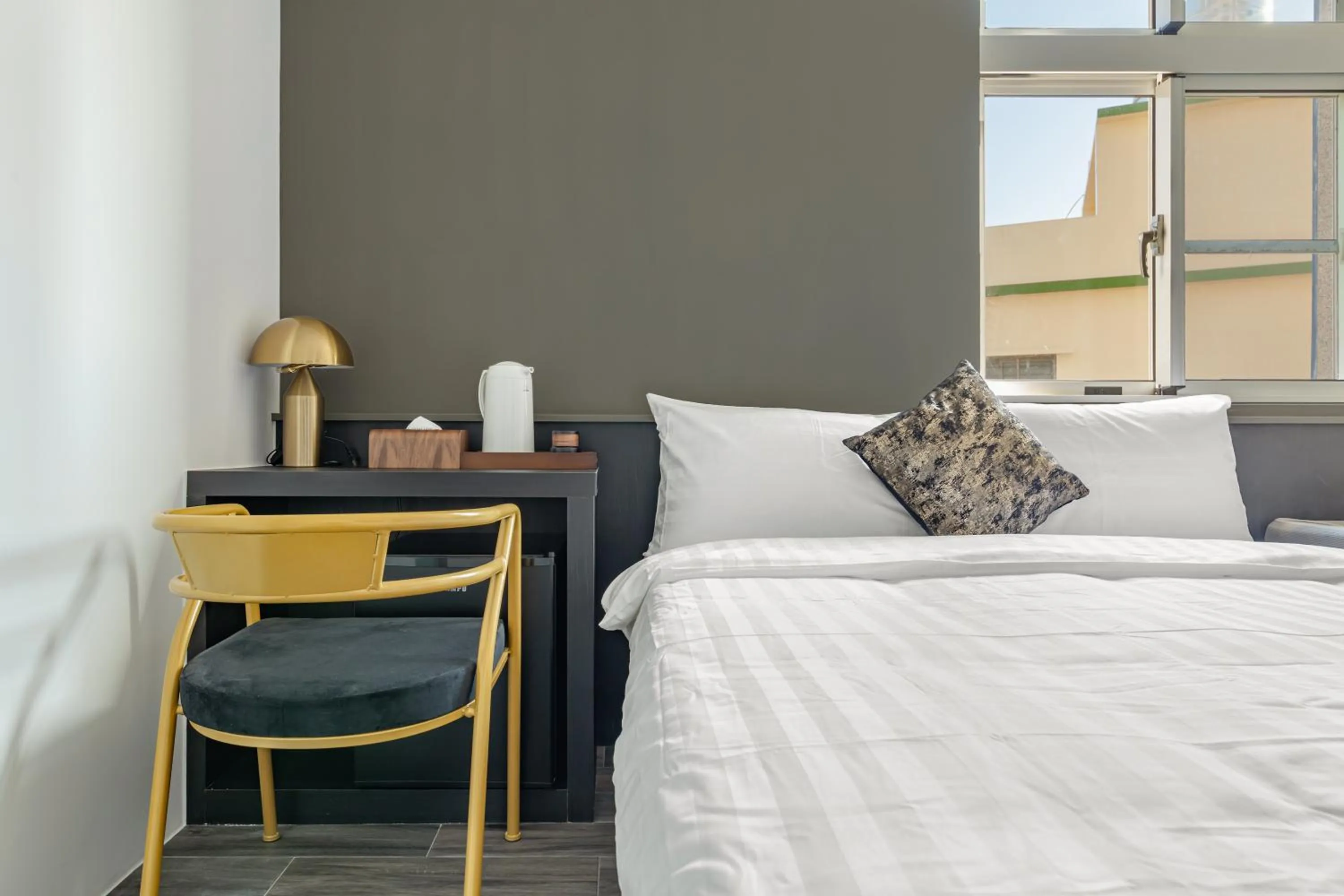 Bed in Sunset Mu Style Inn