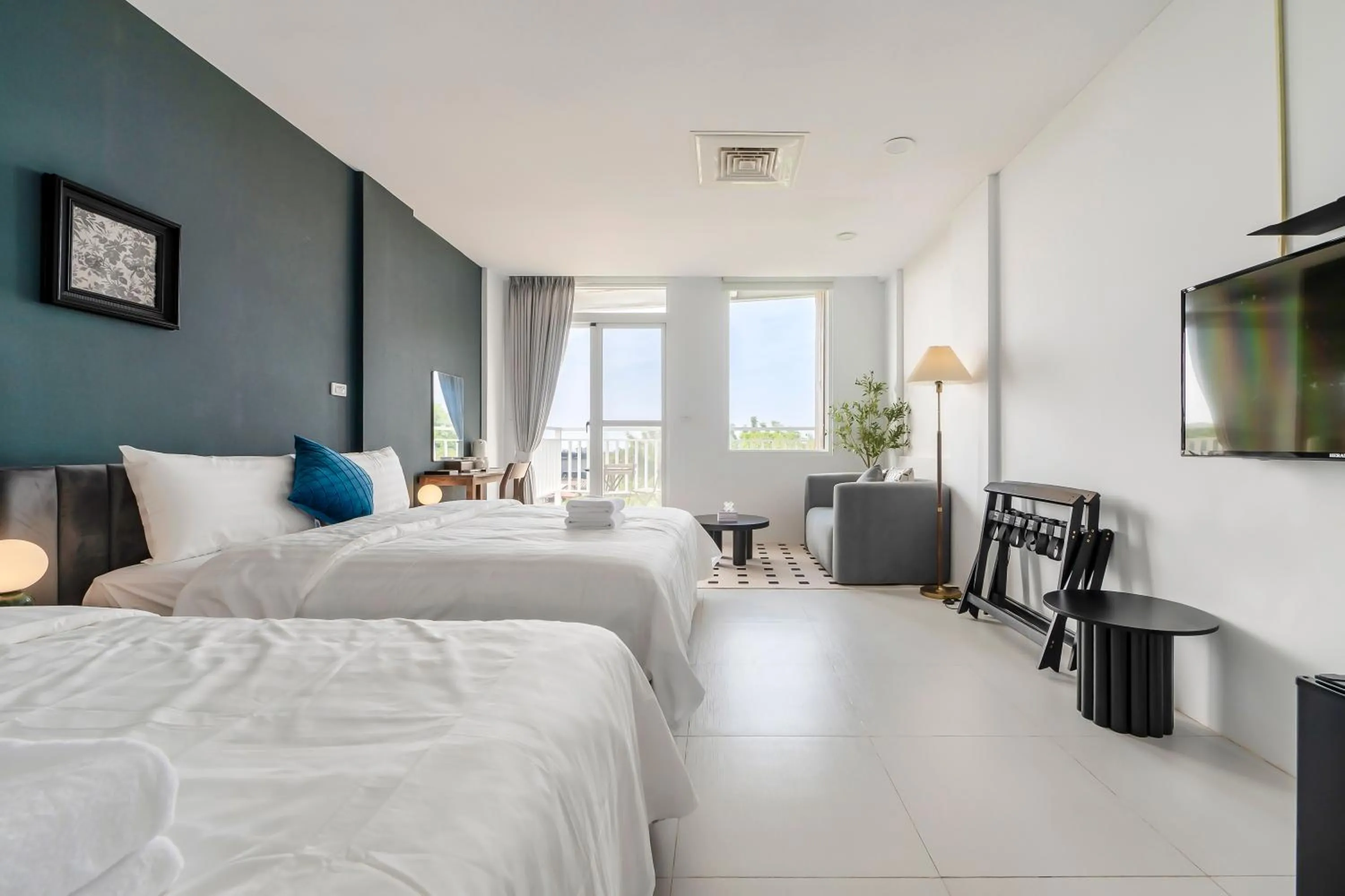 Photo of the whole room, Bed in Sunset Mu Style Inn