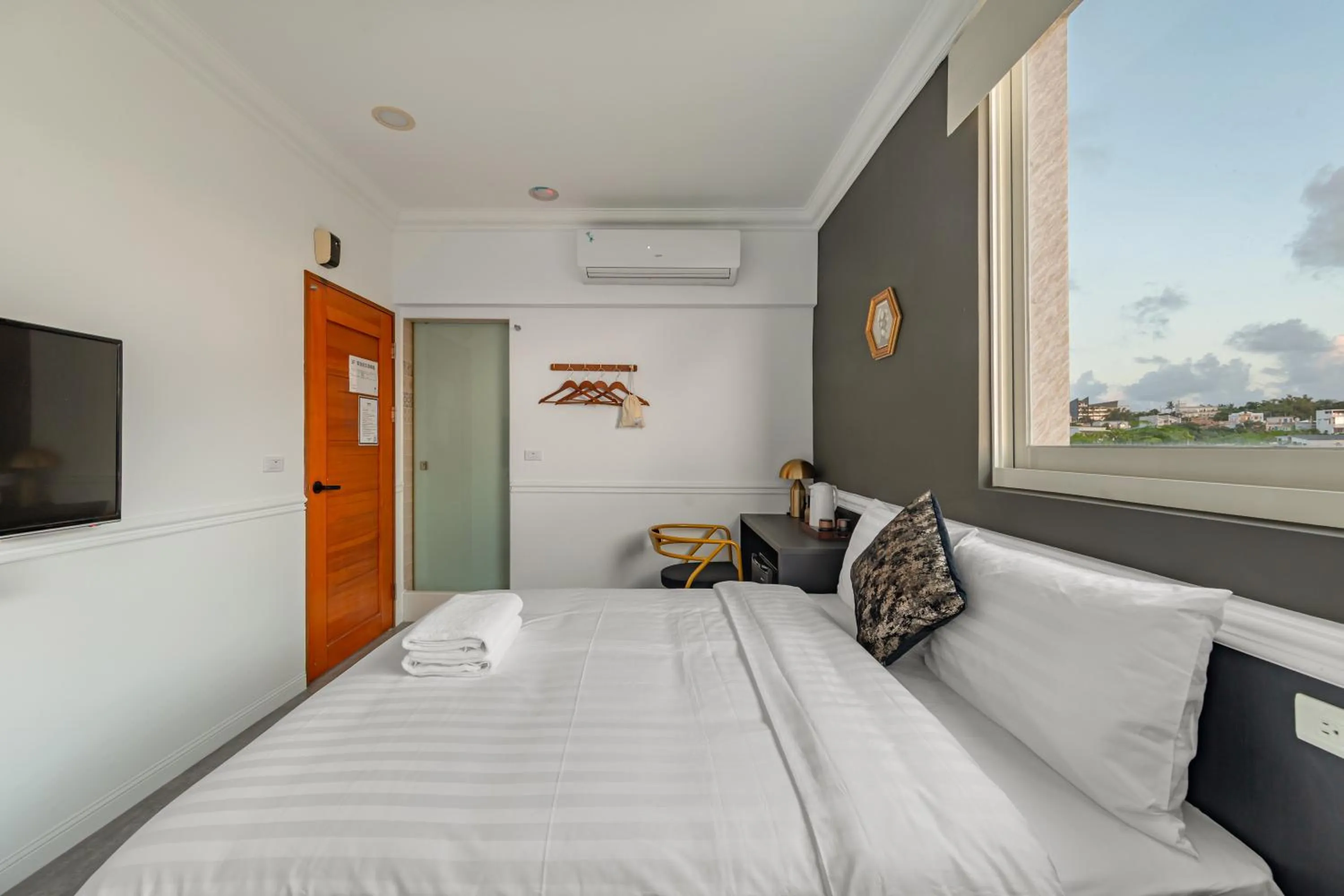 Bed in Sunset Mu Style Inn