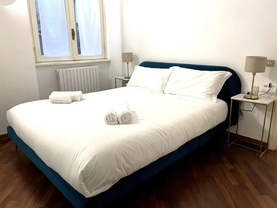 Bed in Tower Gombito's Apartment
