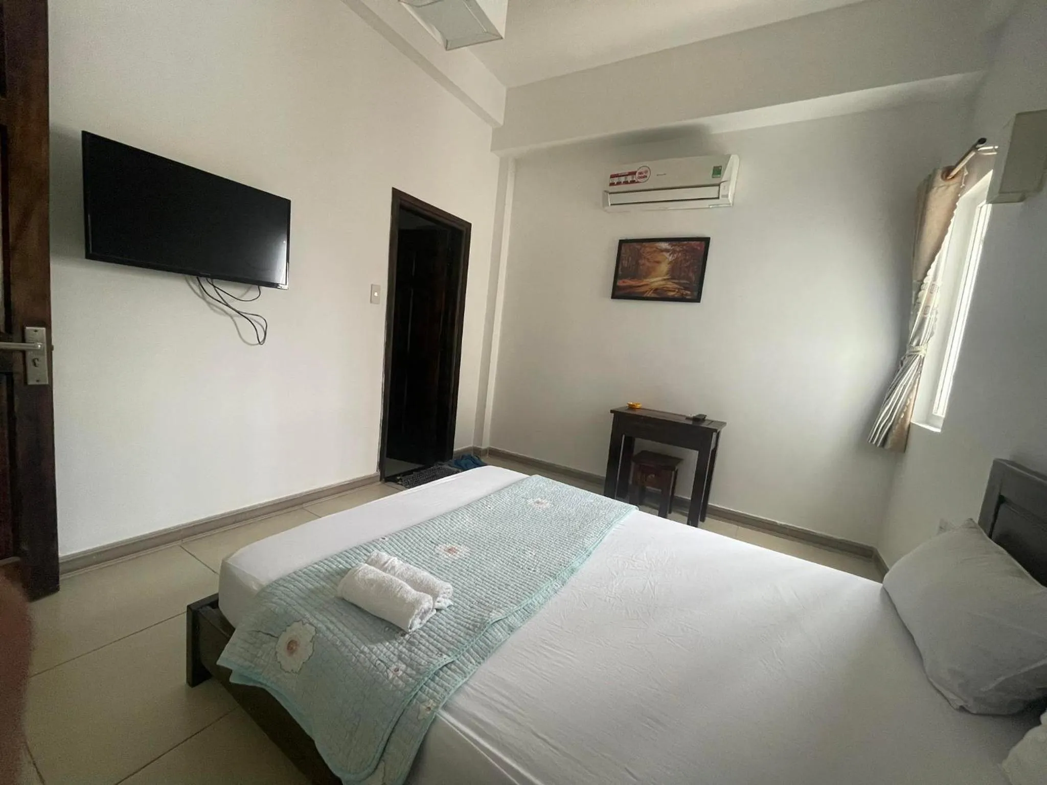 Bedroom in OYO 1179 Minh An Motel