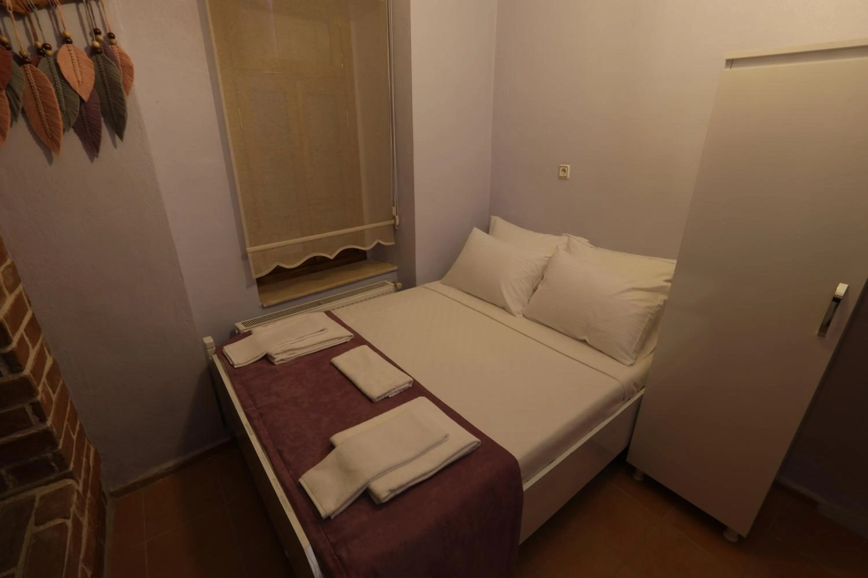 Bed in Cunda Pera Otel