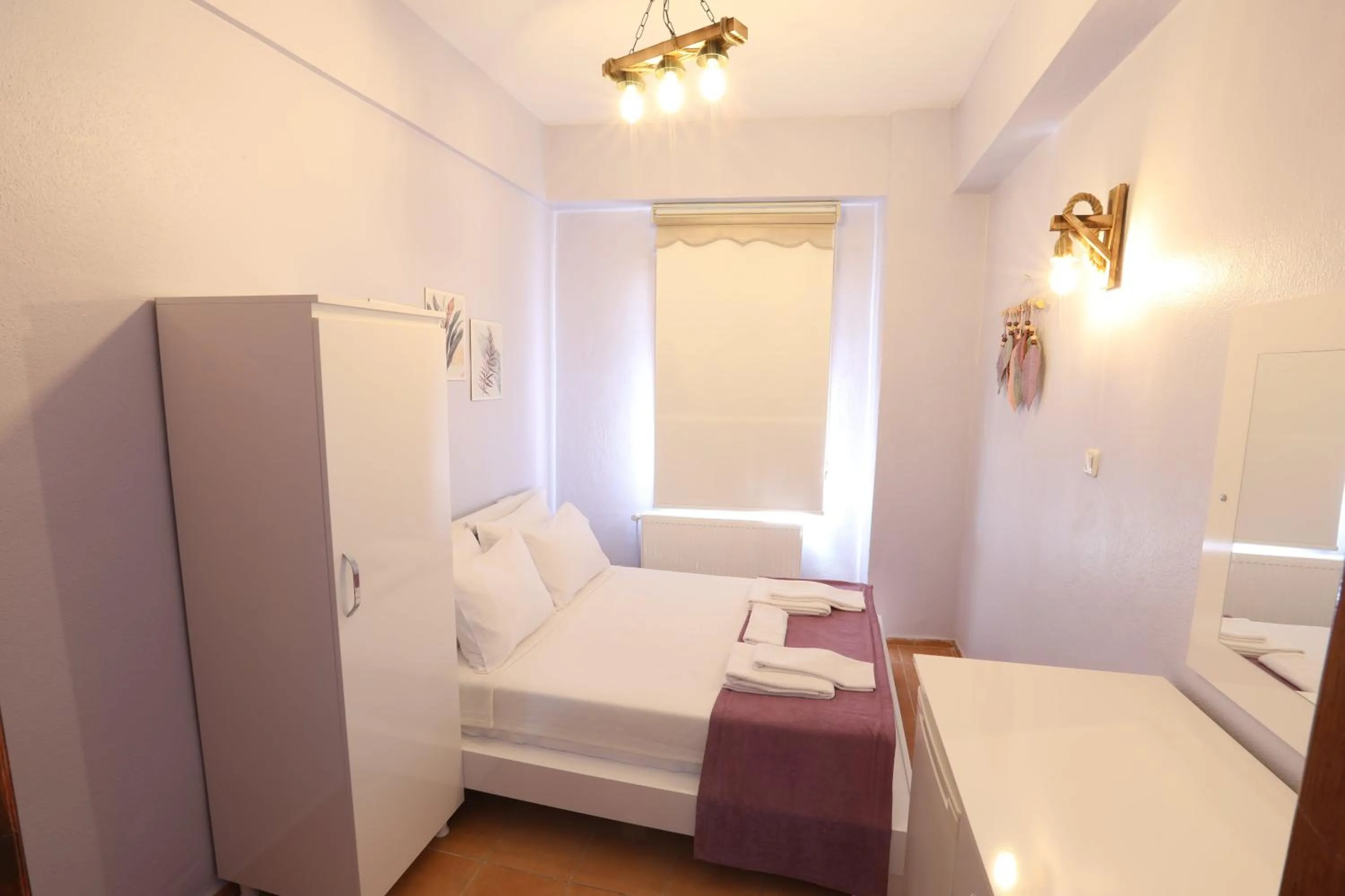 Bed in Cunda Pera Otel