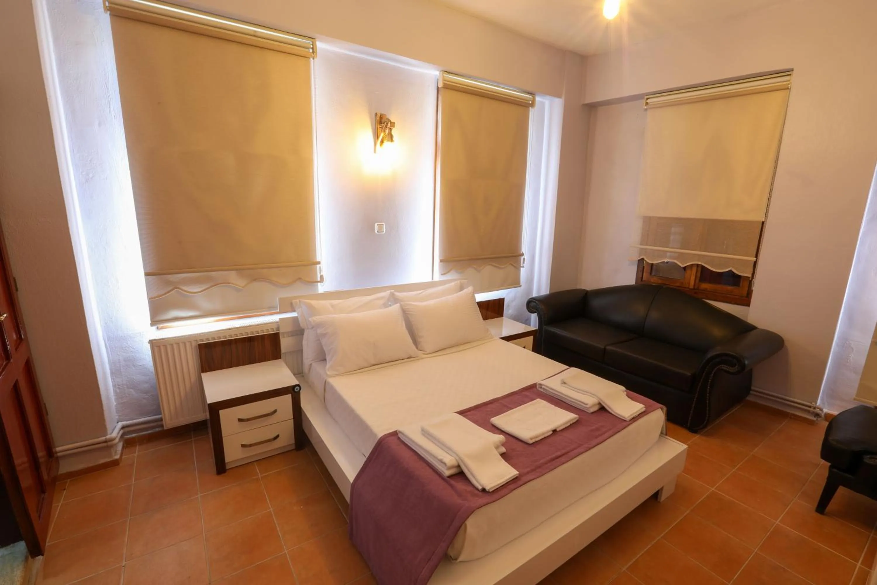 Bed in Cunda Pera Otel