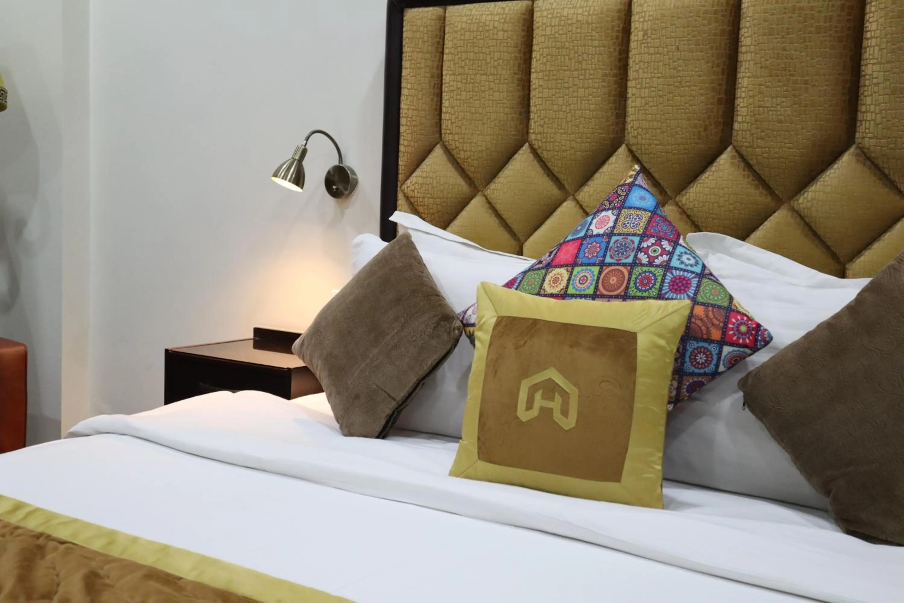 Bed in Hayyat Luxury Hotel Suites