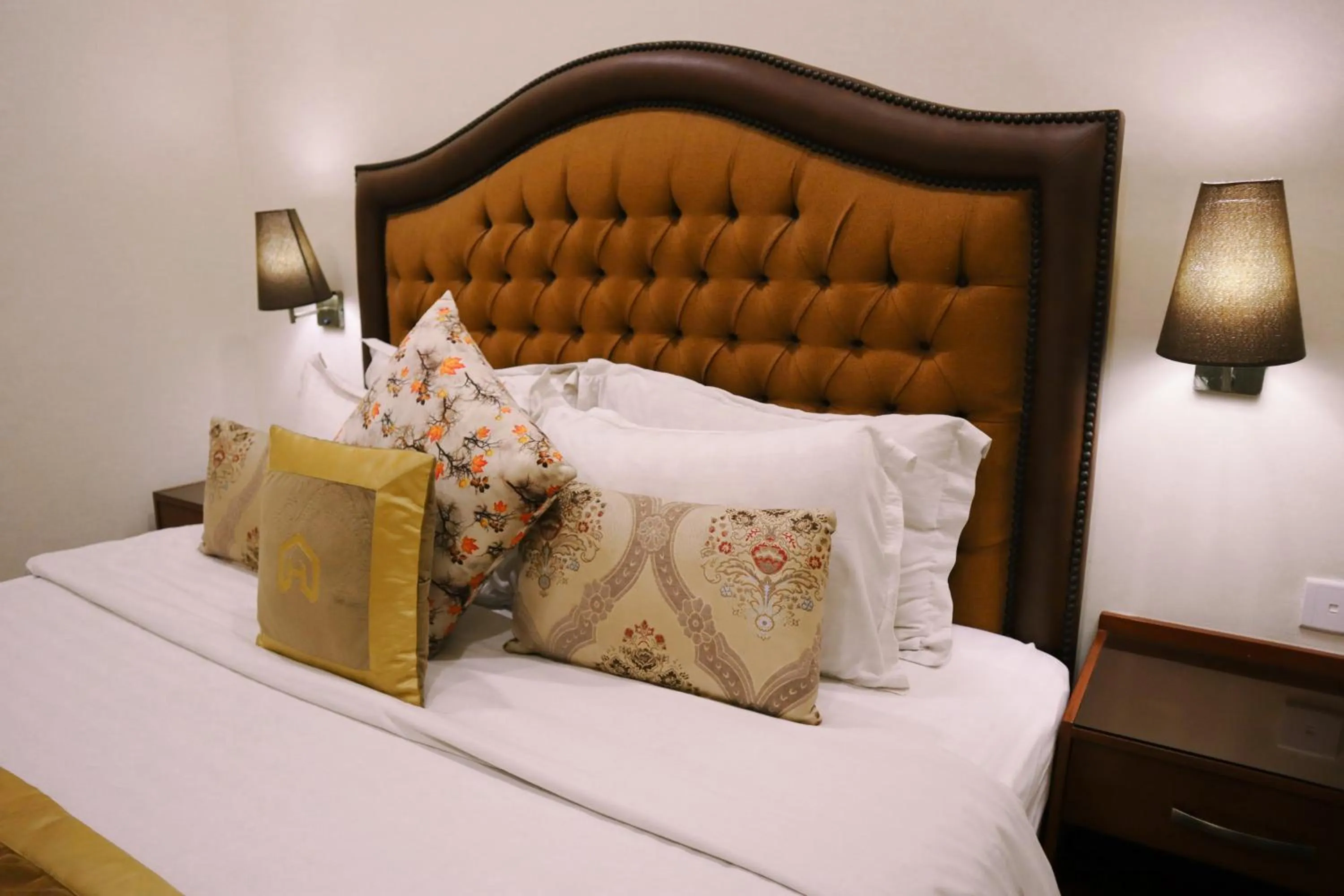 Bed in Hayyat Luxury Hotel Suites