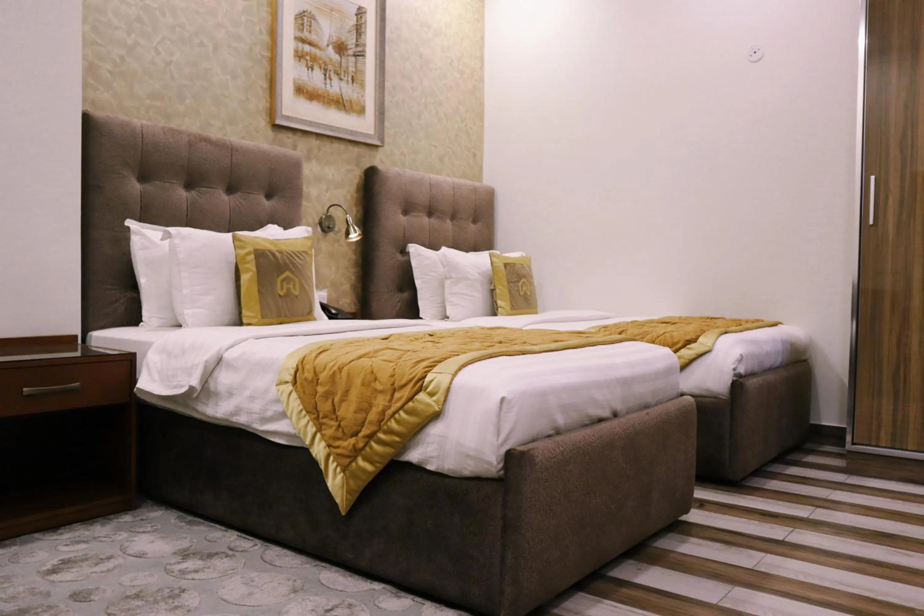 Bed in Hayyat Luxury Hotel Suites
