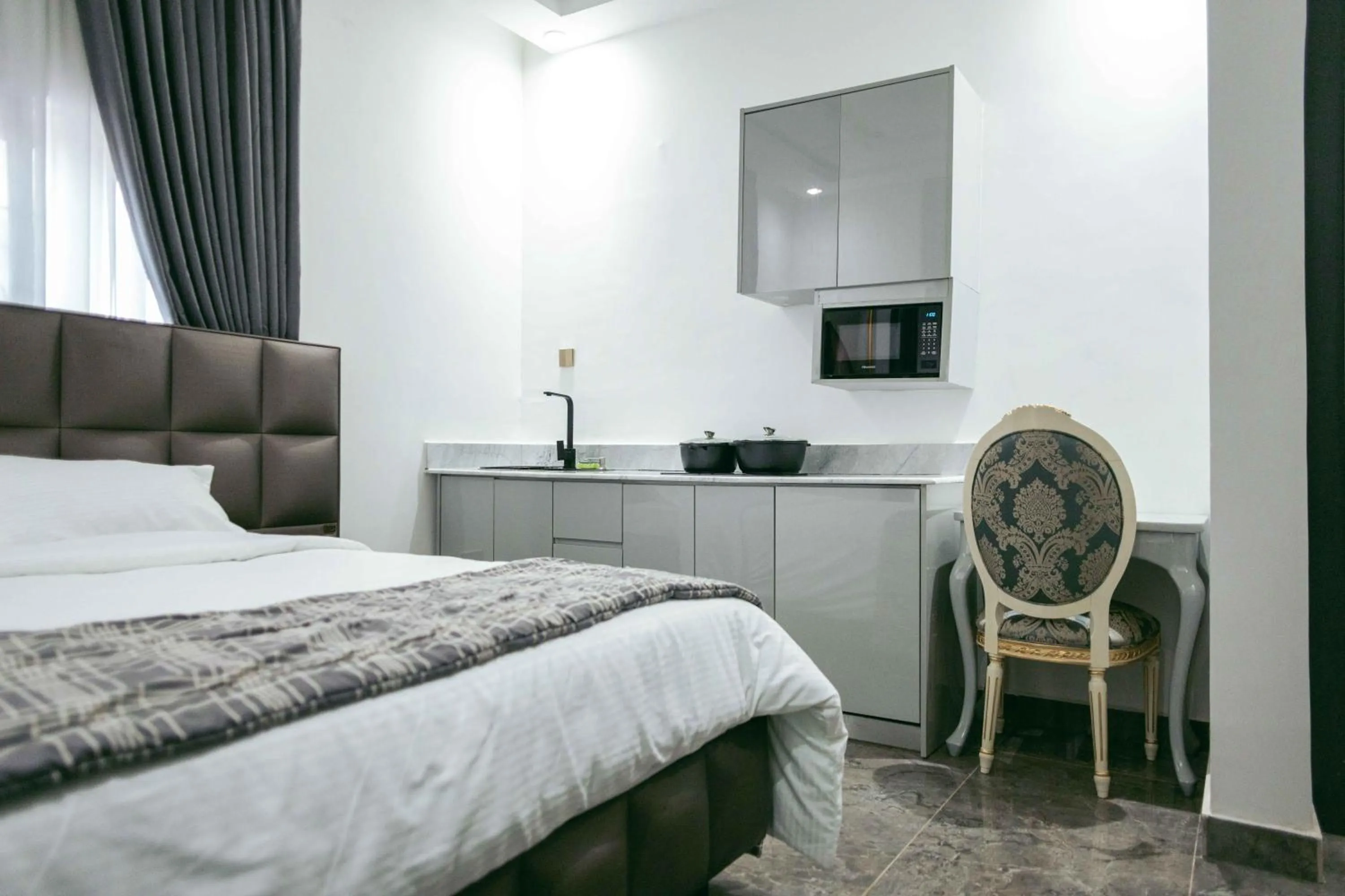 Bed in Phoenix Luxury Apartments