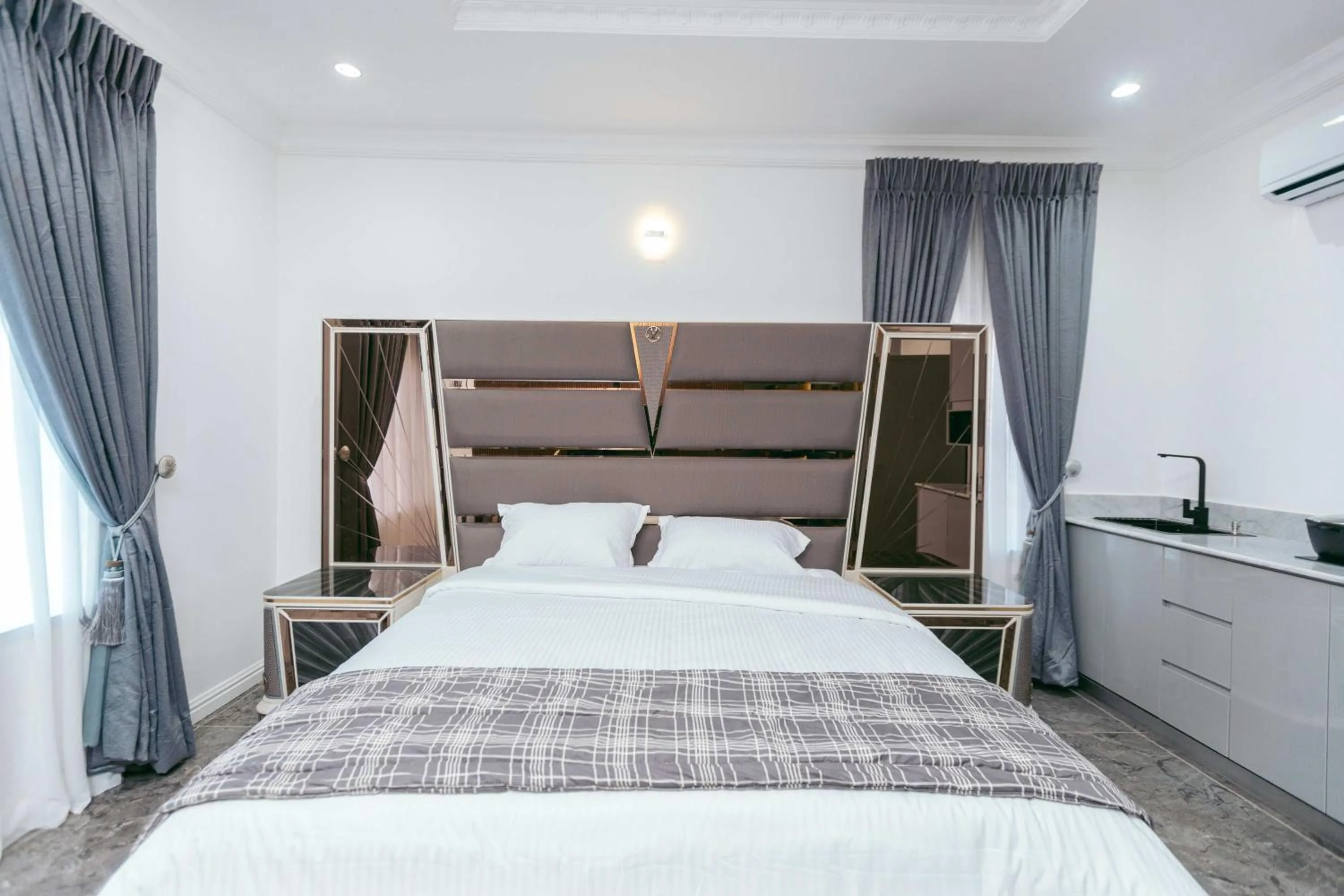 Bed in Phoenix Luxury Apartments