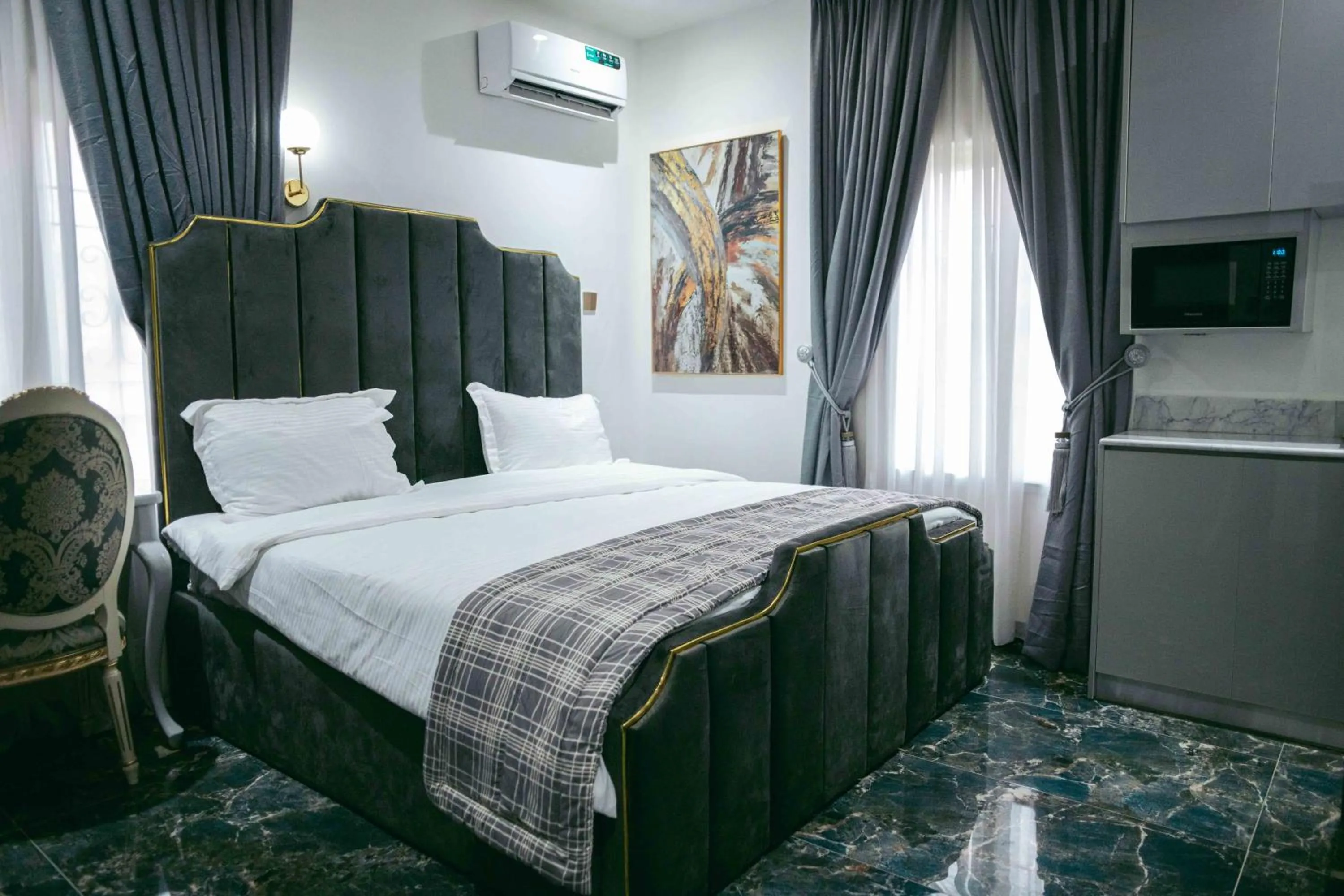 Bed in Phoenix Luxury Apartments