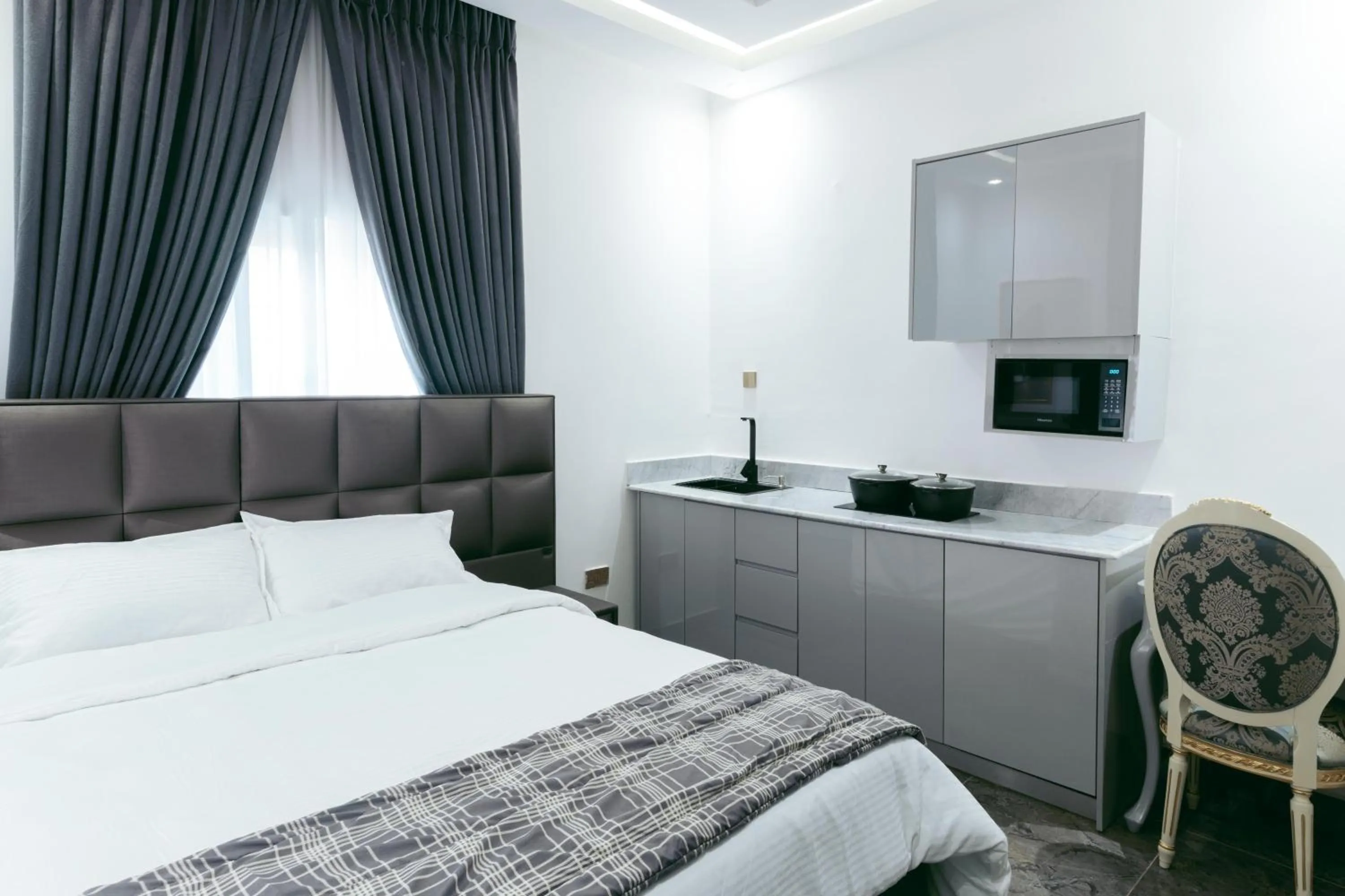 Bed in Phoenix Luxury Apartments