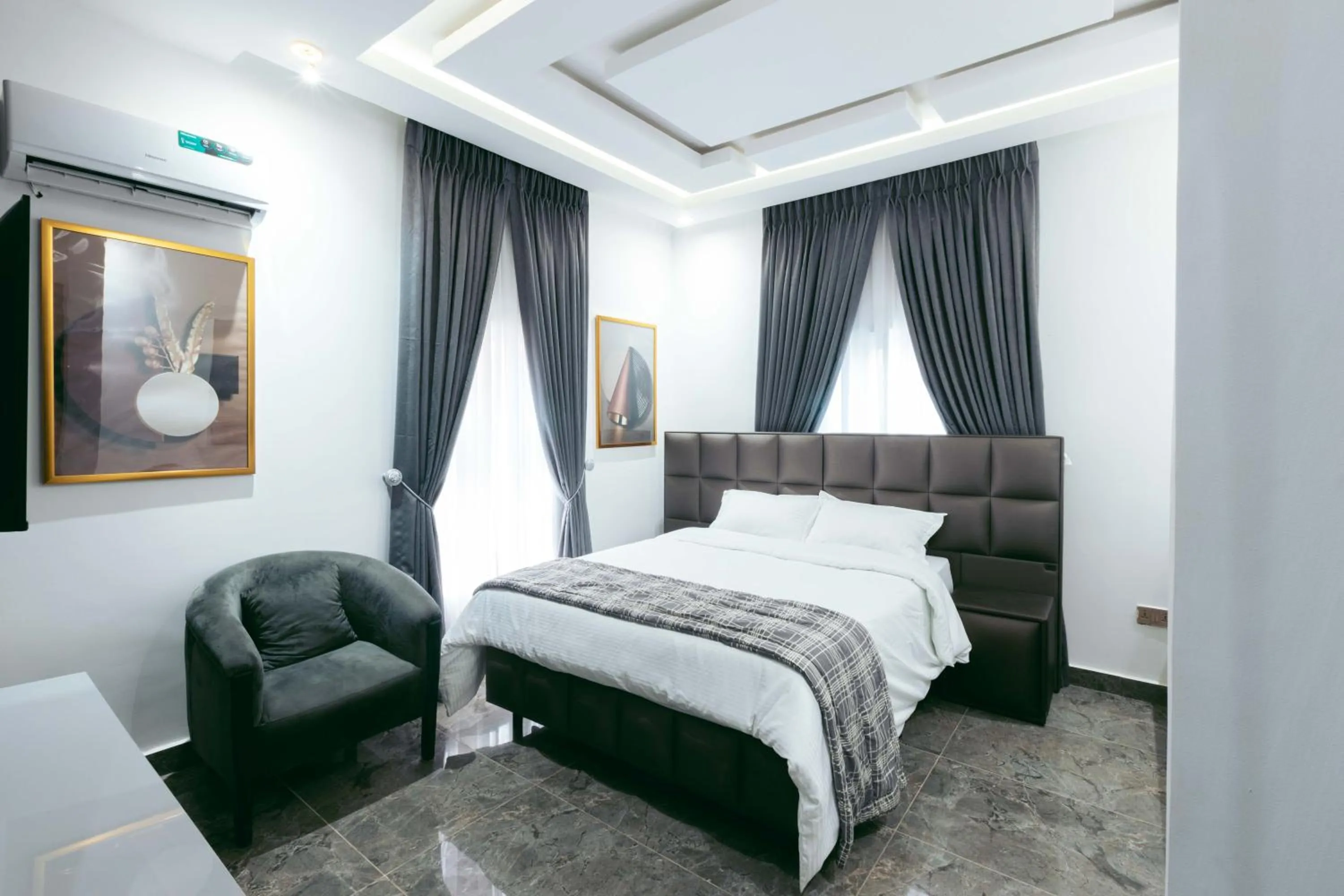 Bed in Phoenix Luxury Apartments