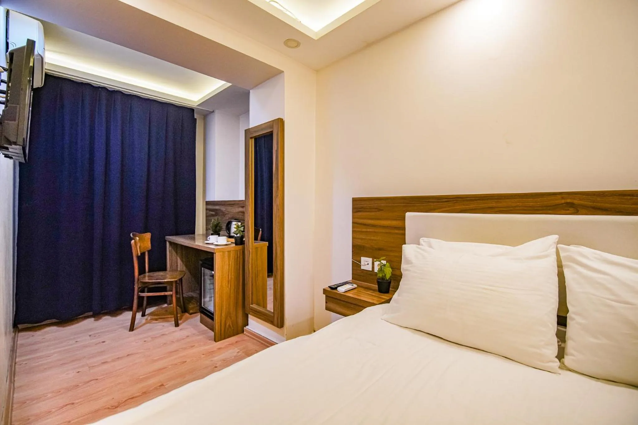 Bed in MITANI SUITES