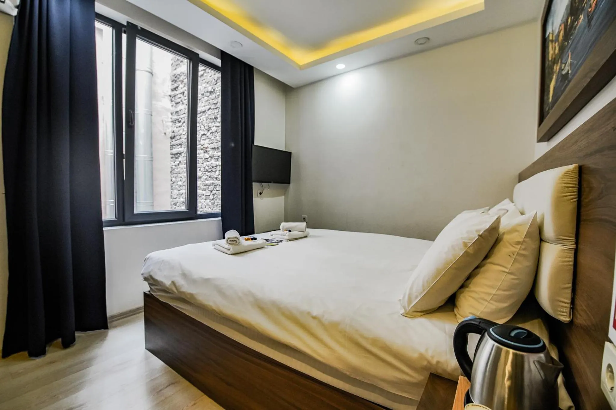 Bed in MITANI SUITES