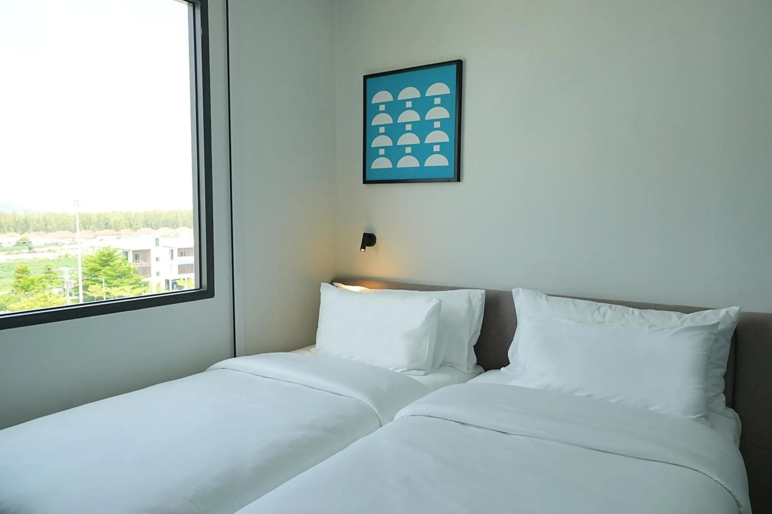 View (from property/room), Bed in GO Hotel Ban Chang at Robinson Lifestyle Ban Chang