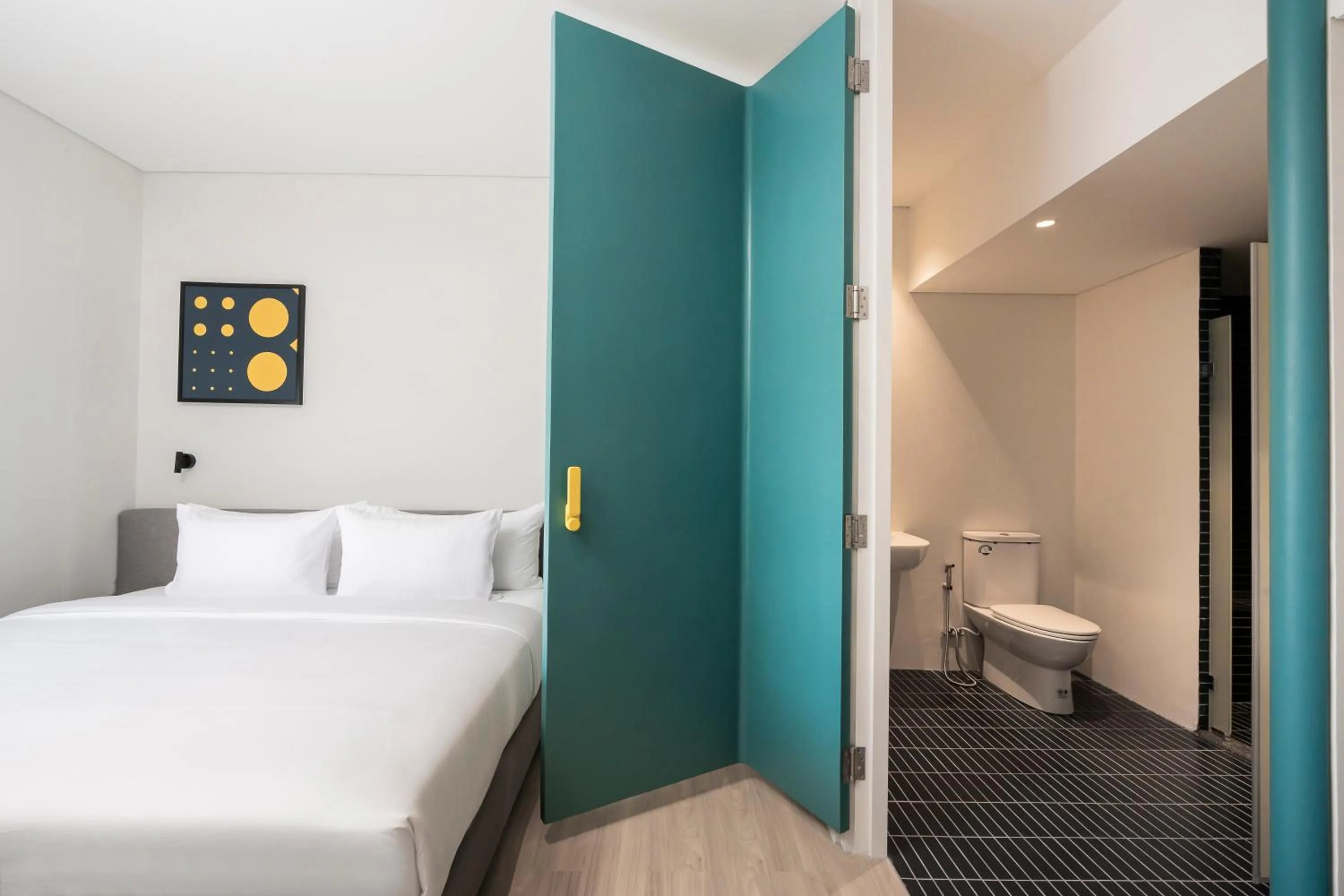 Toilet, Bed in GO Hotel Ban Chang at Robinson Lifestyle Ban Chang