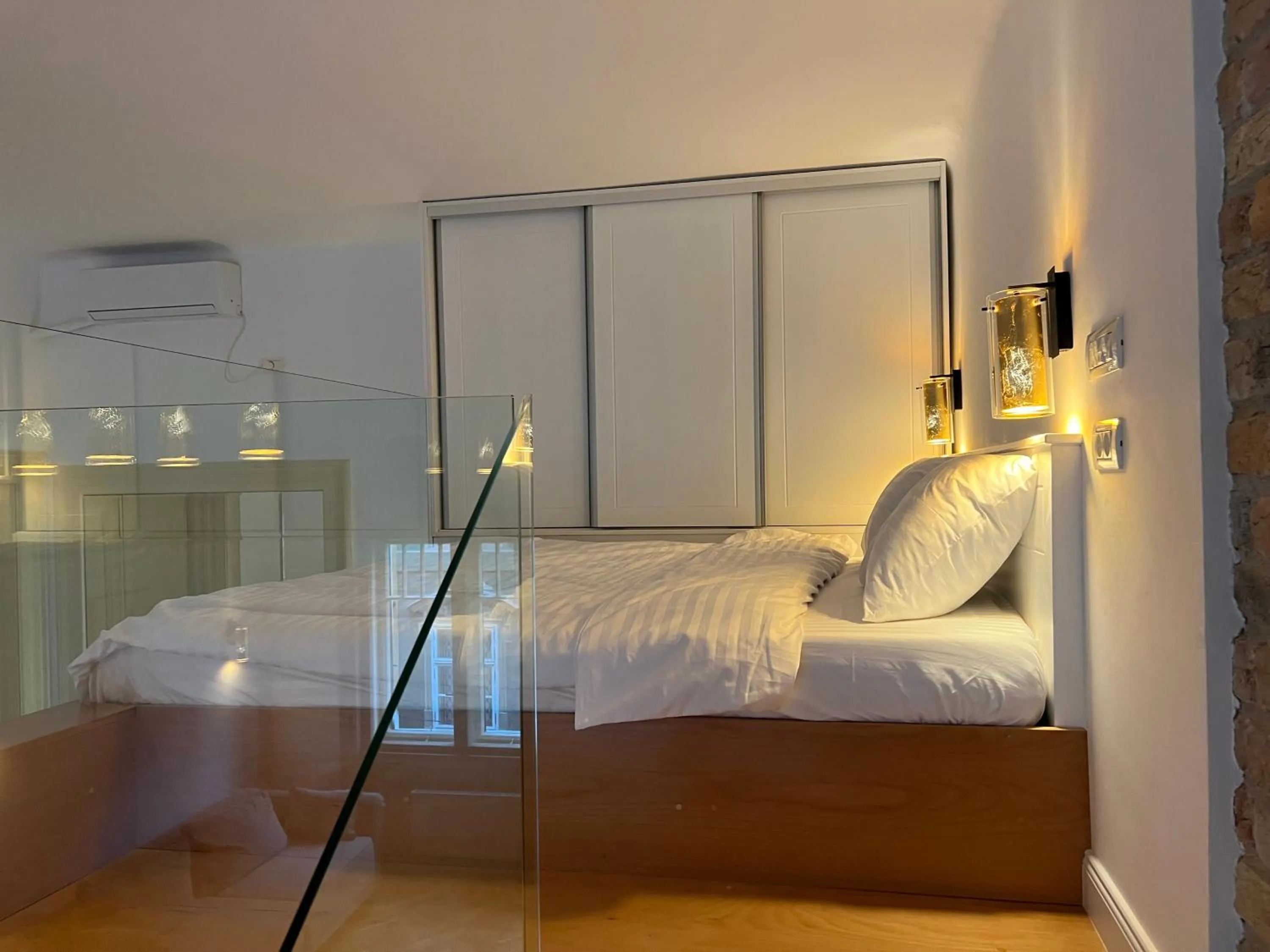 Bed in VISAJ Deluxe Downtown