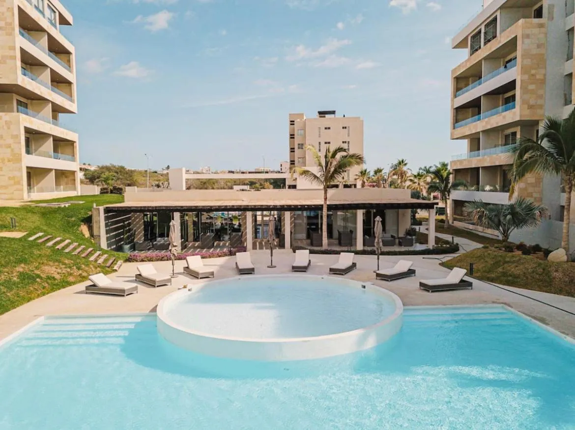Swimming pool in Loft con balcón privado, estacionamiento gratis - Un oasis en Los Cabos