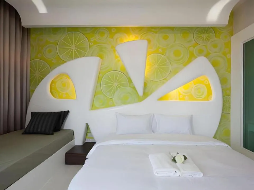 Bed in O-Bay Design Hotel Prachuap