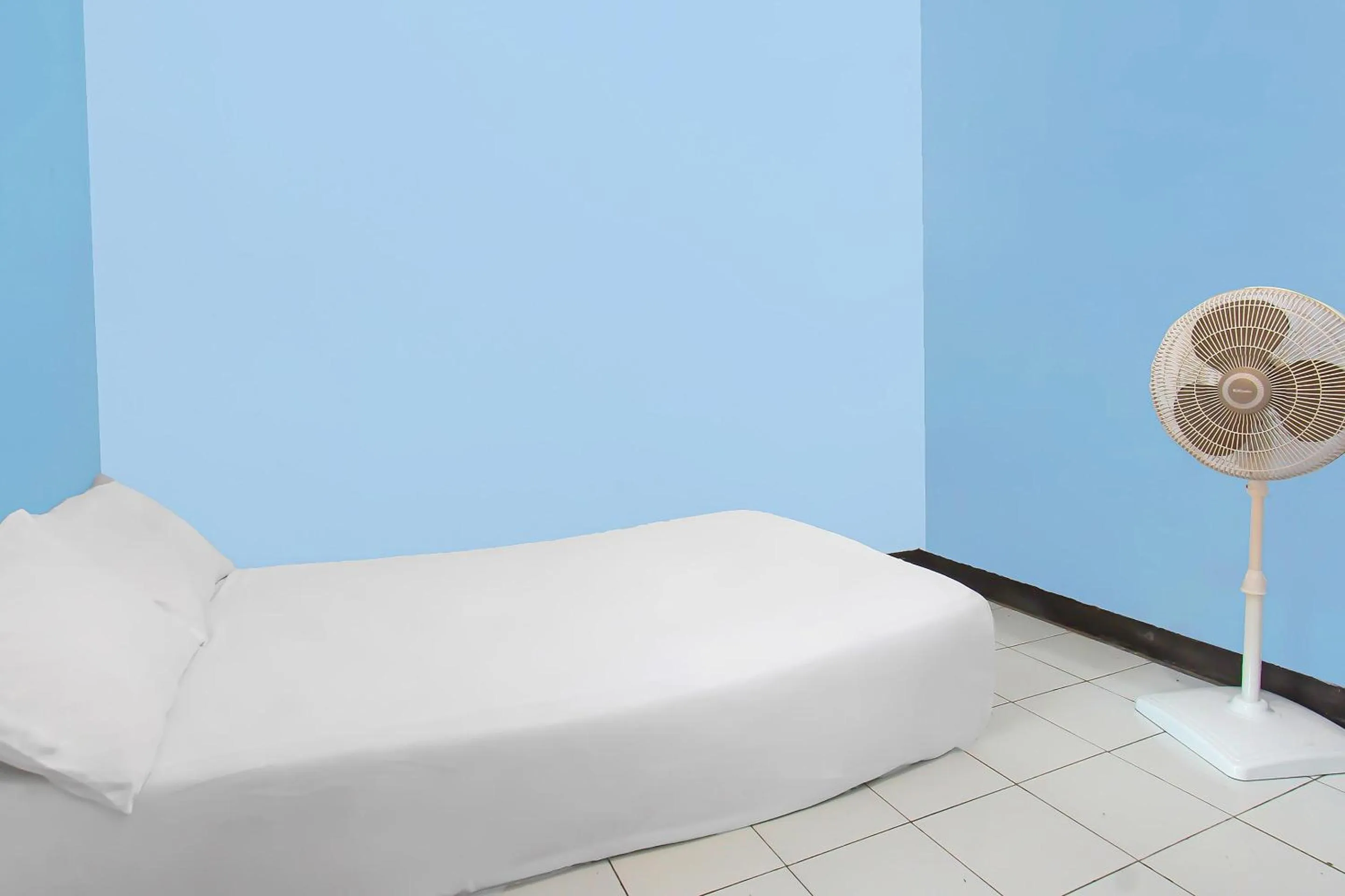 Bedroom in Hotel O Sukandi Homestay Near The Semeton Homestay