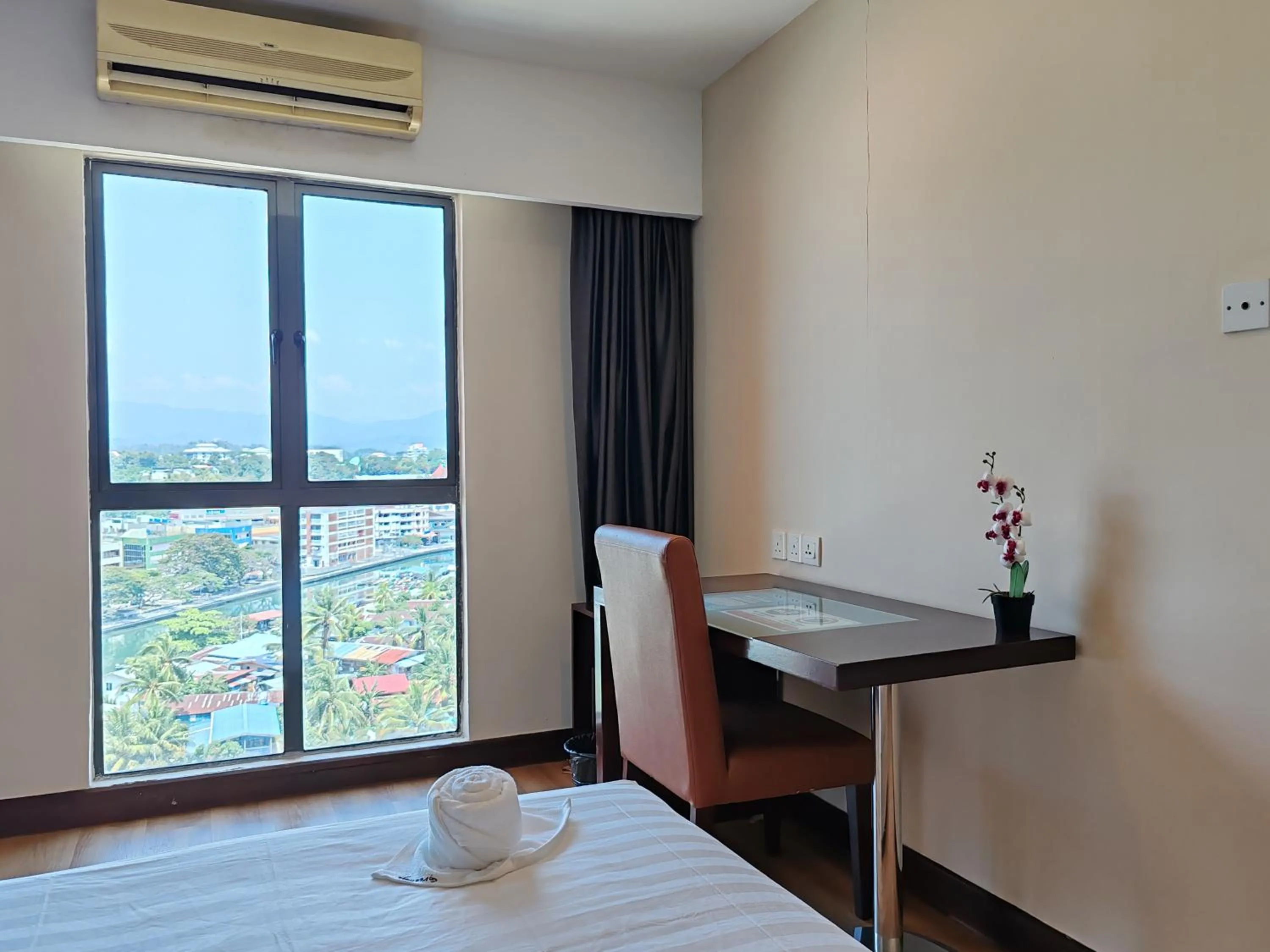 Bed in Greenage MingSuite 明绿时代套房 Kota Kinabalu 亚庇市中心