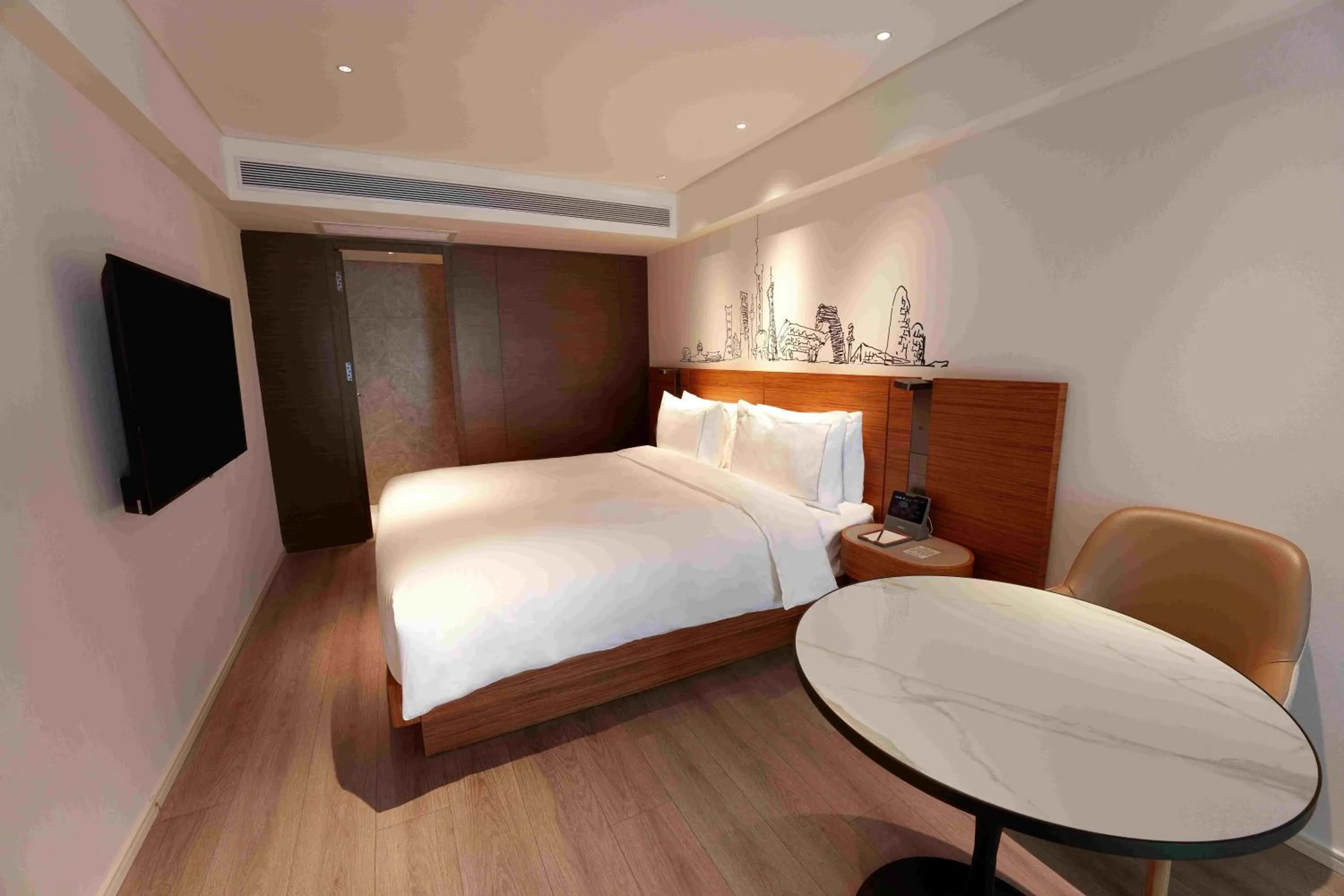 Photo of the whole room, Bed in UrCove by Hyatt Shanghai Lujiazui Expo Center