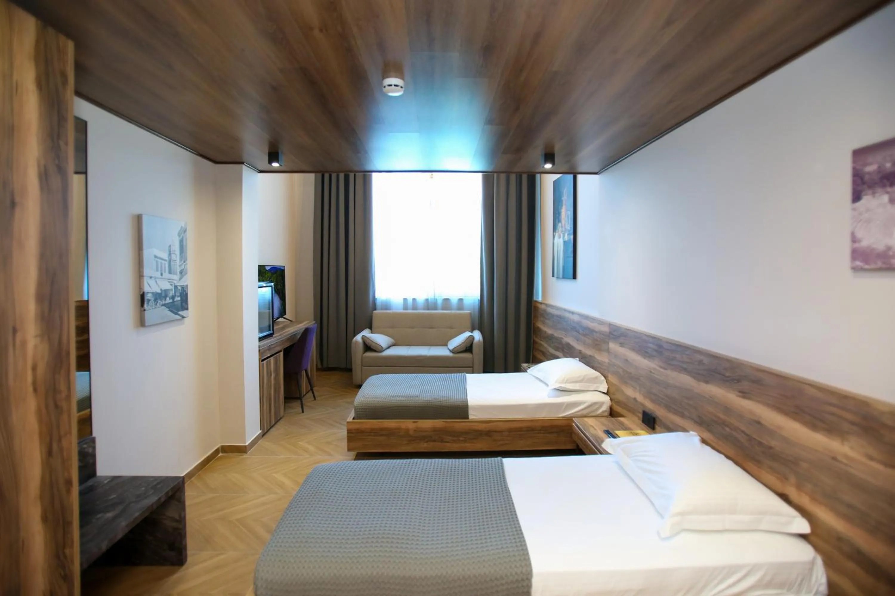 Bed in Belvedere Hotel & SPA