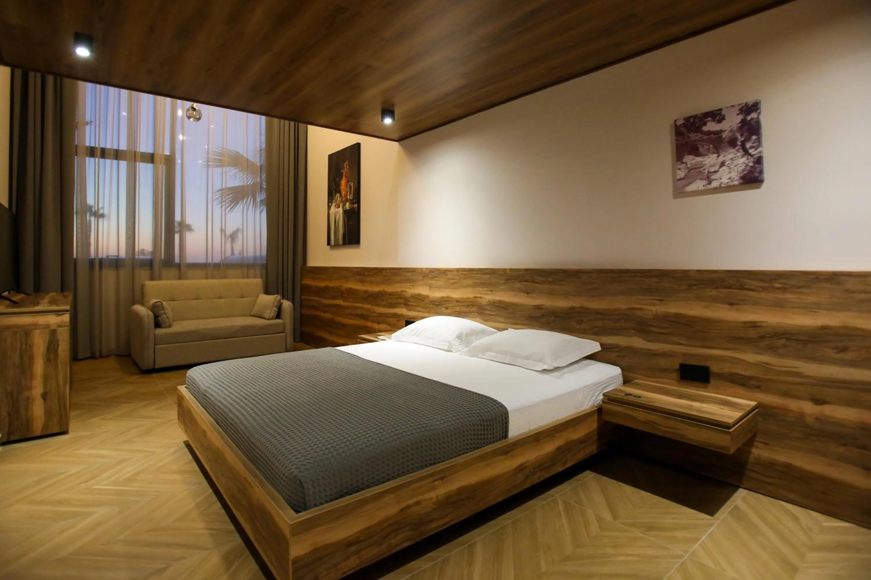 Bed in Belvedere Hotel & SPA