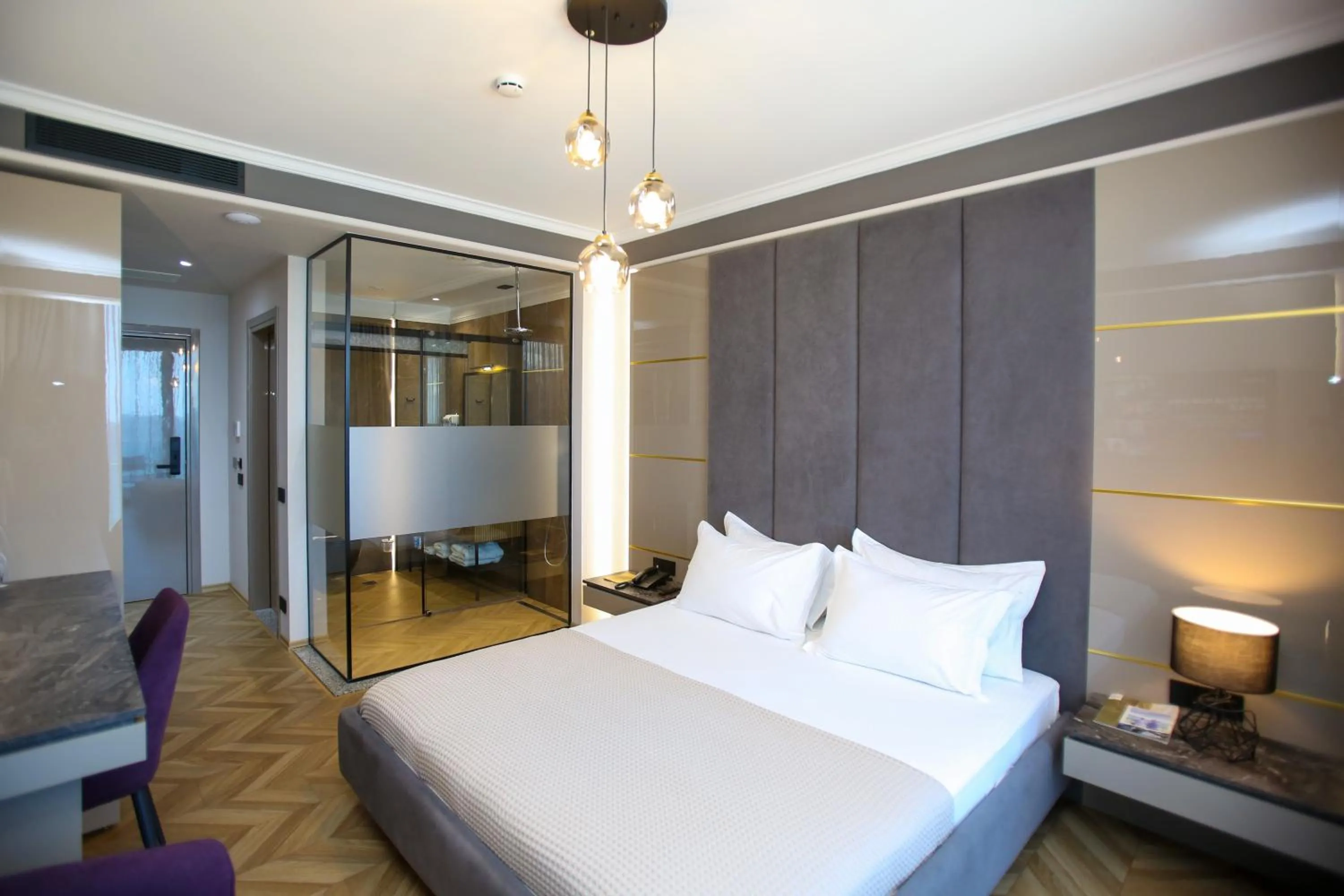 Bed in Belvedere Hotel & SPA