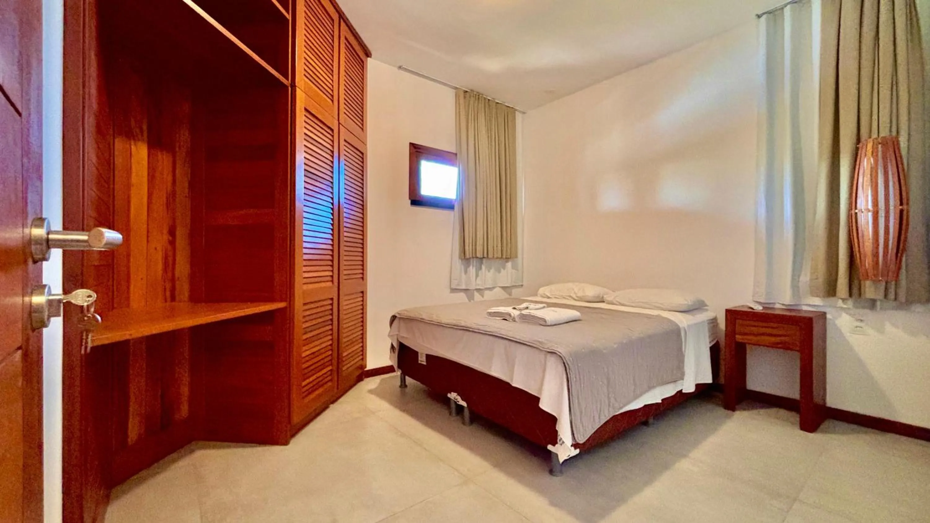 Bed in Dream Beach Cumbuco Superior Oceanfront Apartments