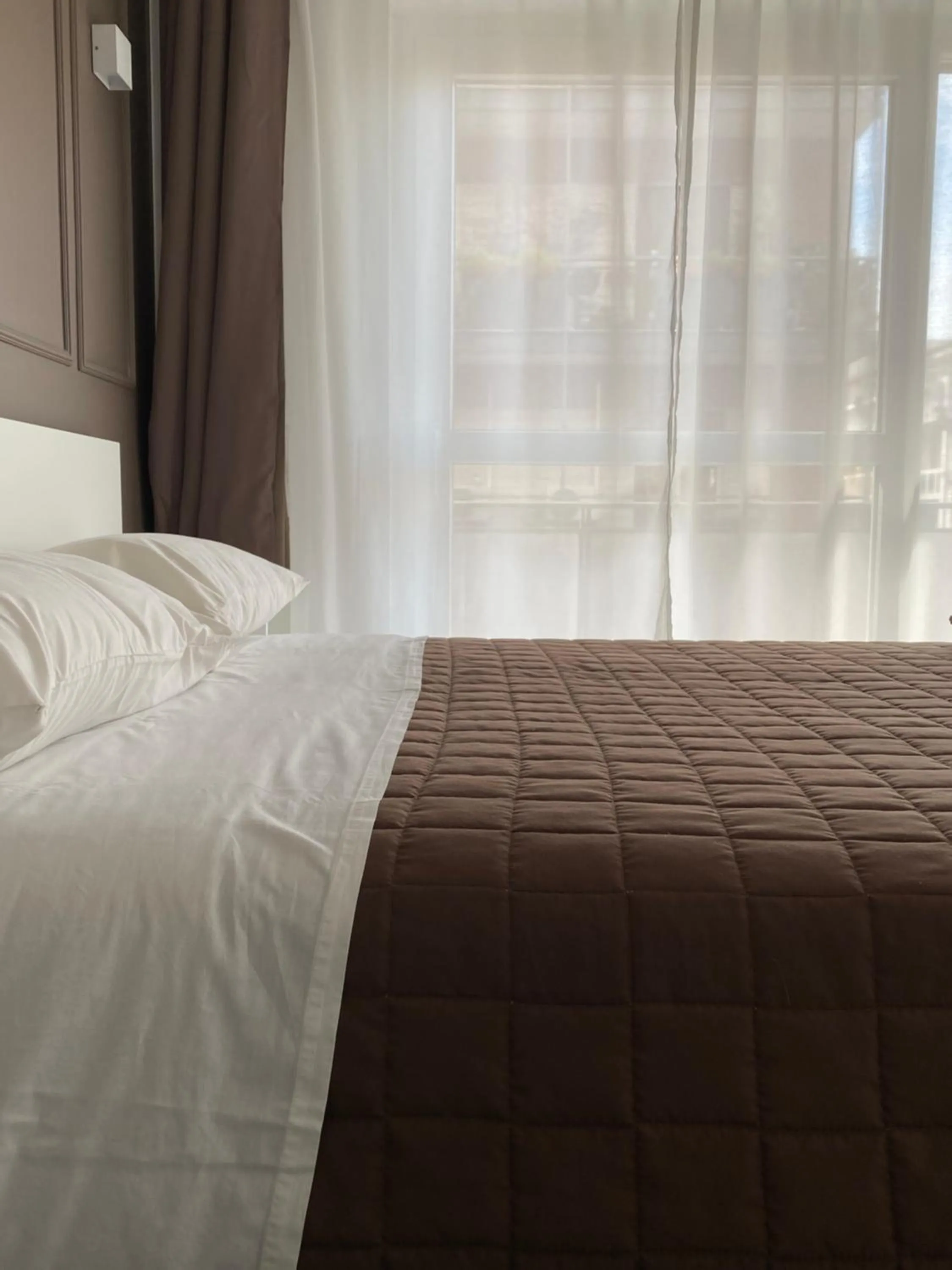 Bed in Quintino Sella rooms