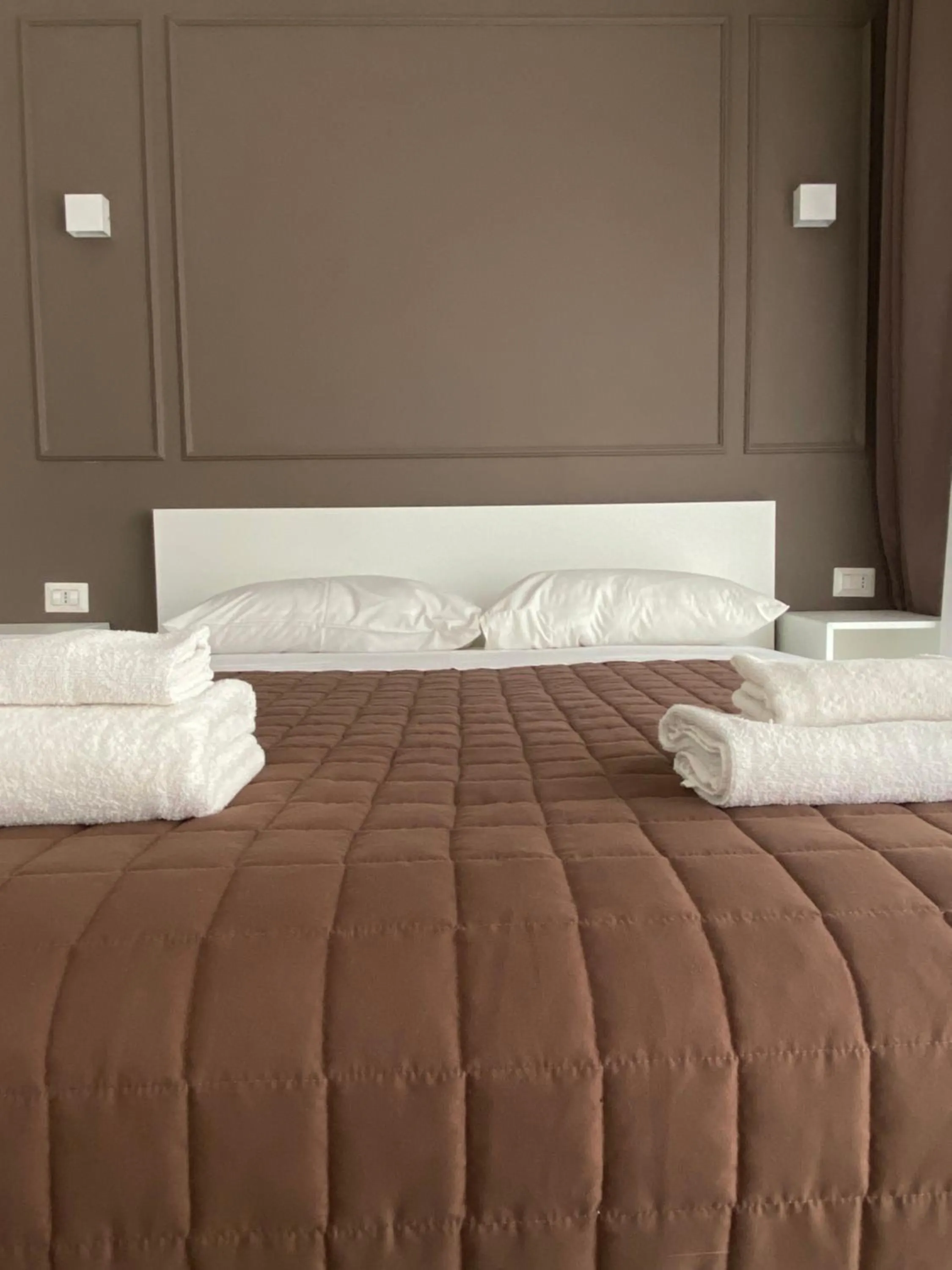 Bed in Quintino Sella rooms
