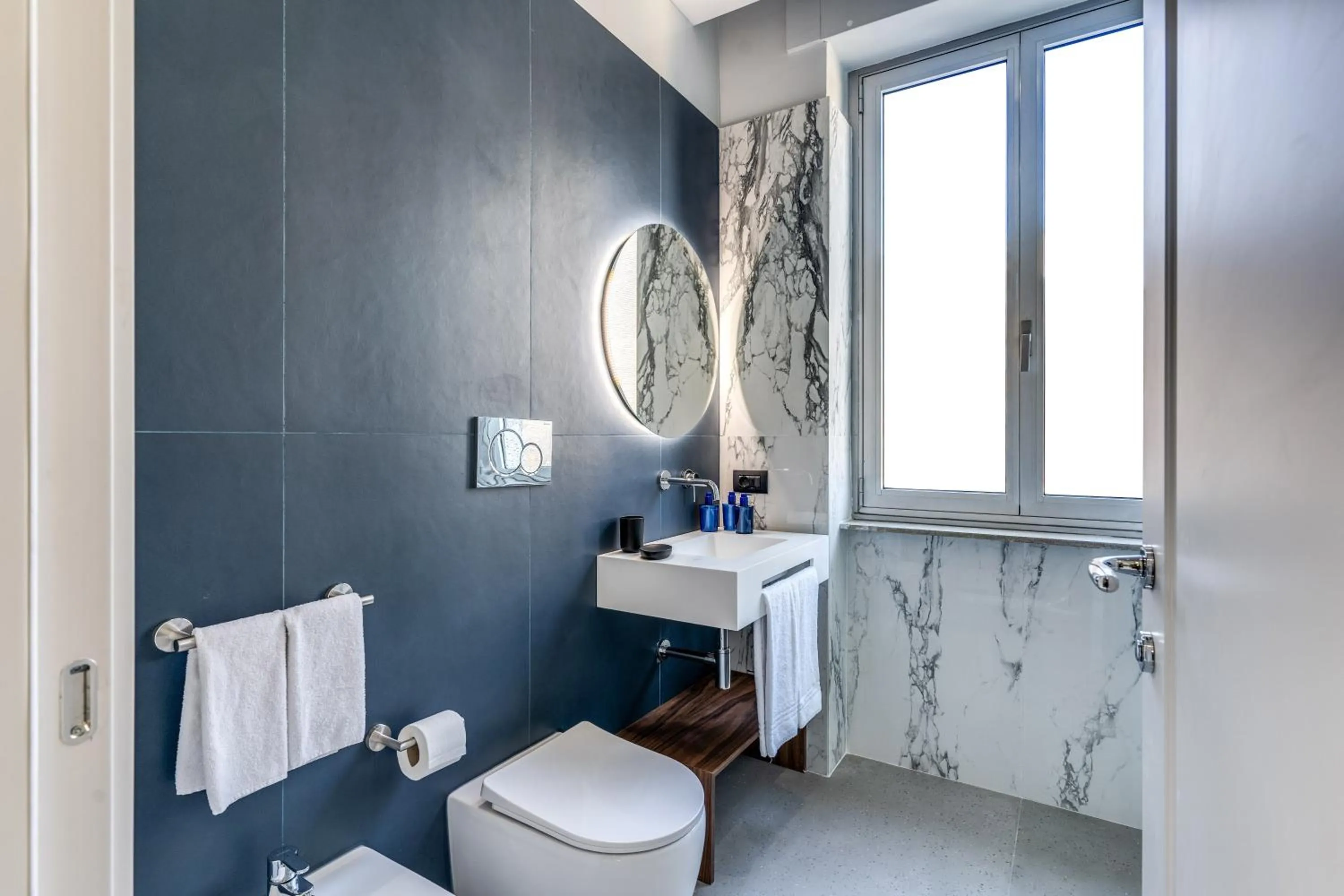 Toilet in Sospeso Boutique Hotel