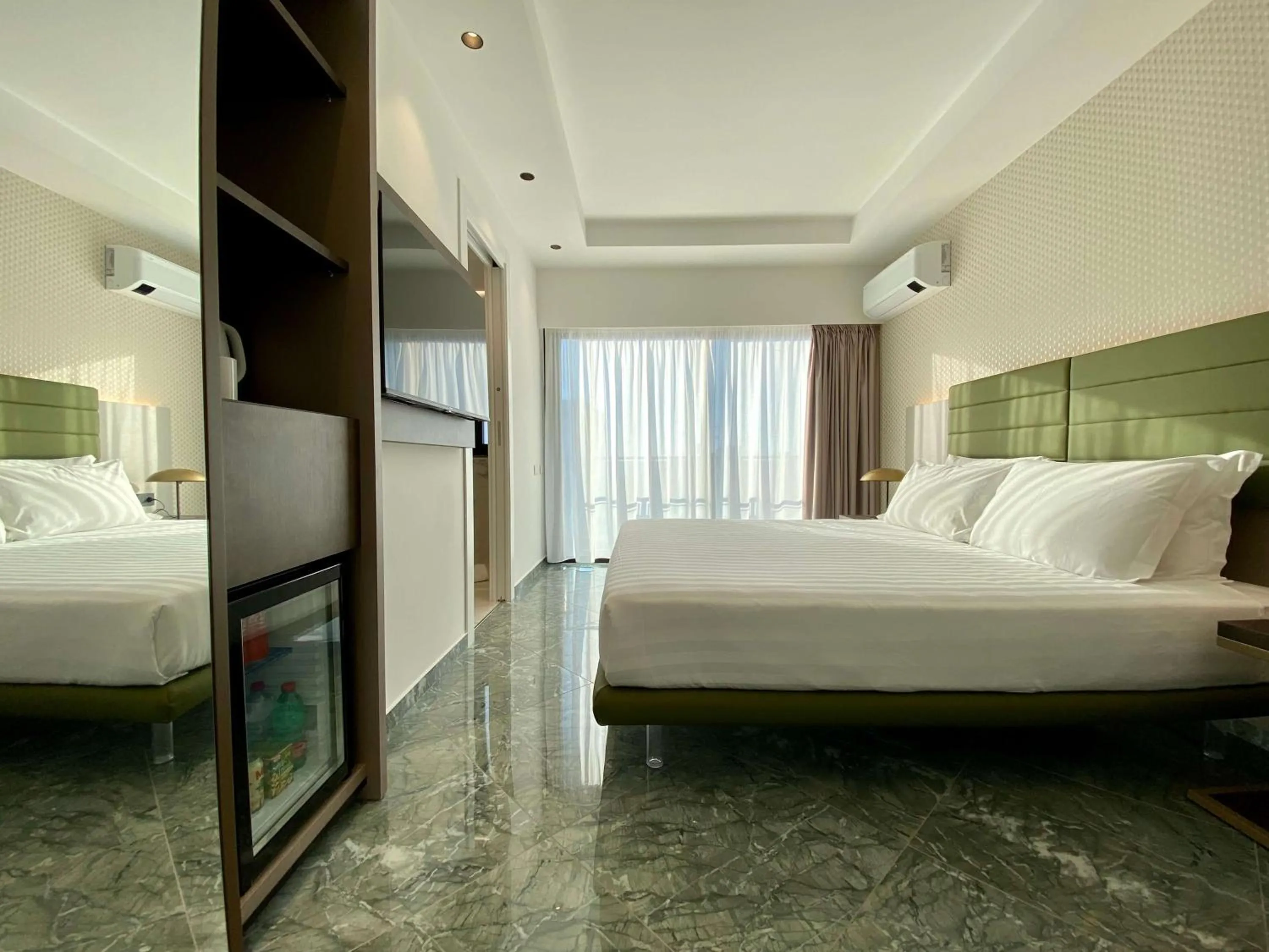 Bed in Salemare Rooms & Suites