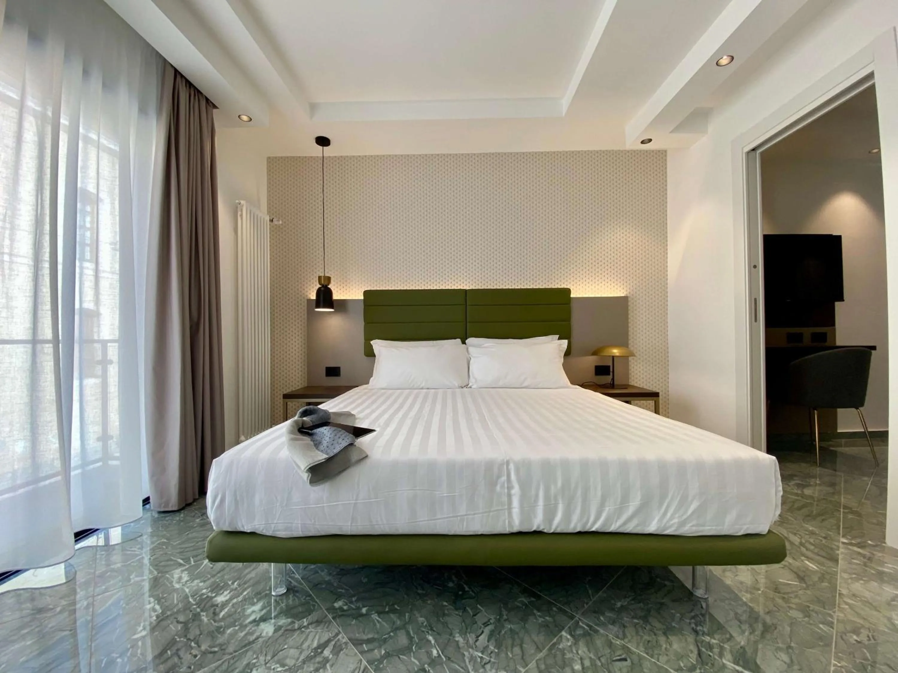 Bed in Salemare Rooms & Suites