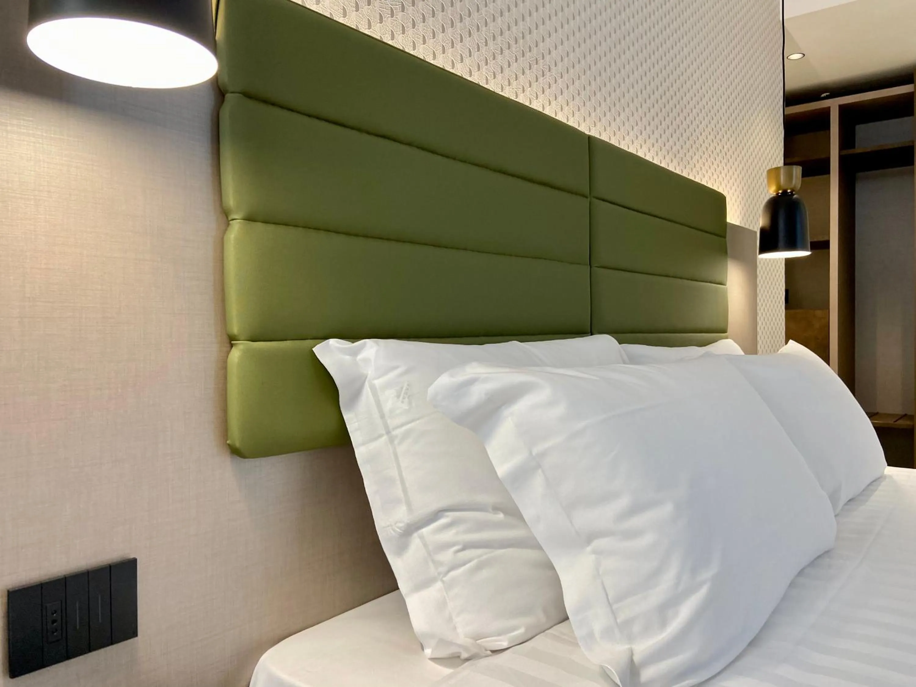 Bed in Salemare Rooms & Suites