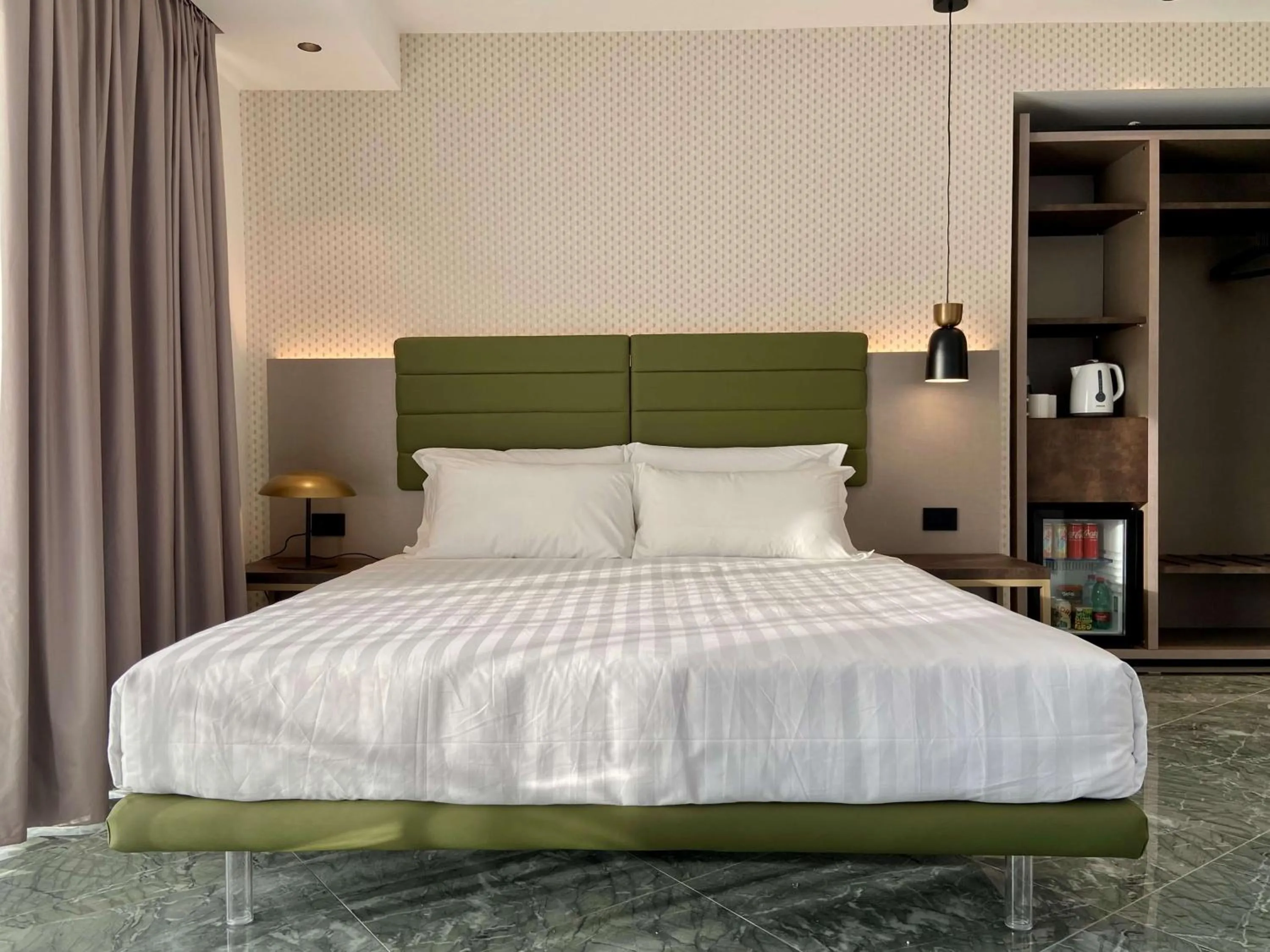 Bed in Salemare Rooms & Suites