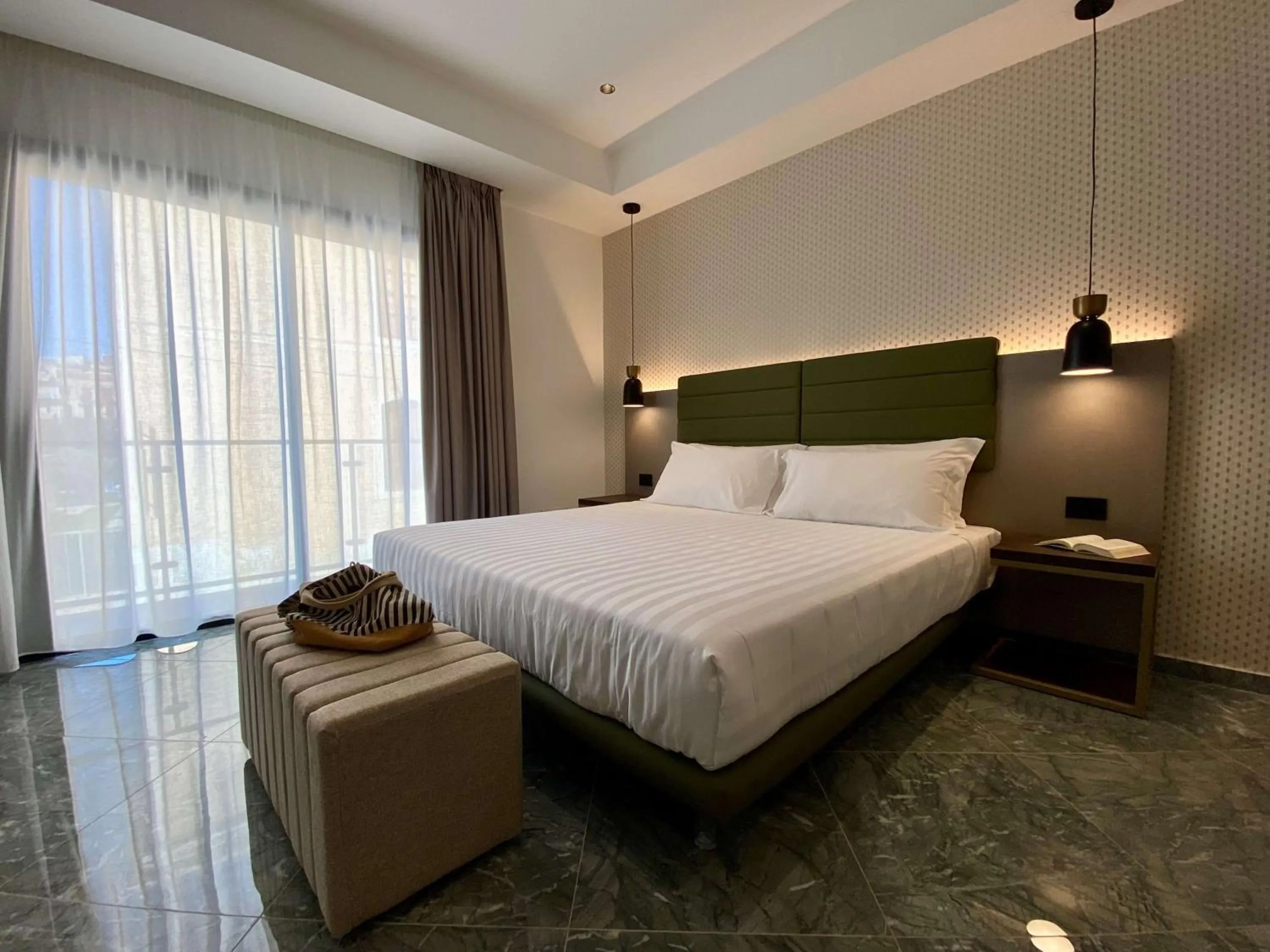 Bed in Salemare Rooms & Suites